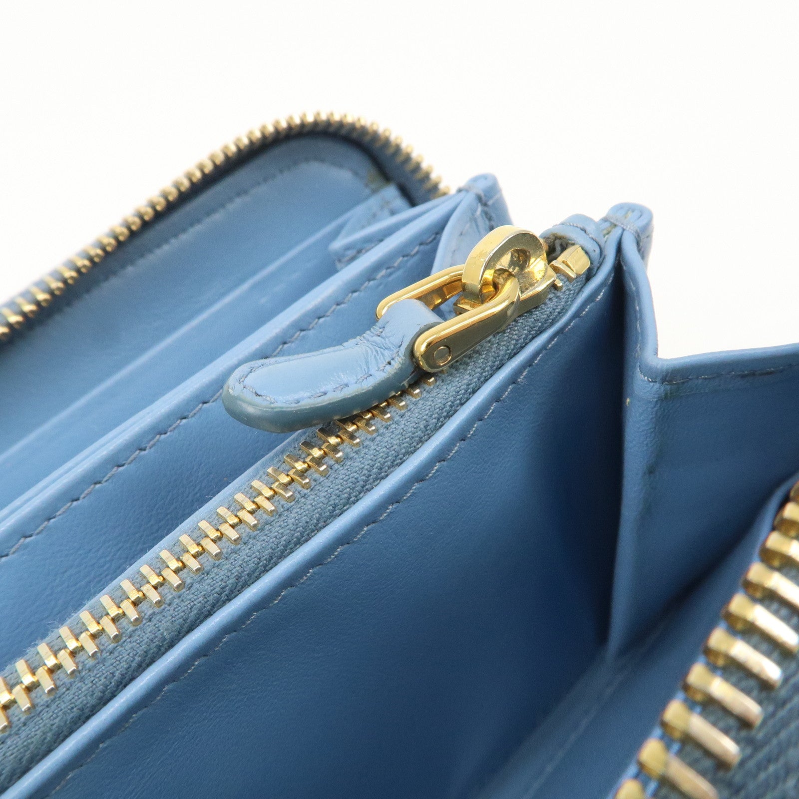 PRADA Logo Vitello Move Leather Zippy Long Wallet Light Blue 1ML506