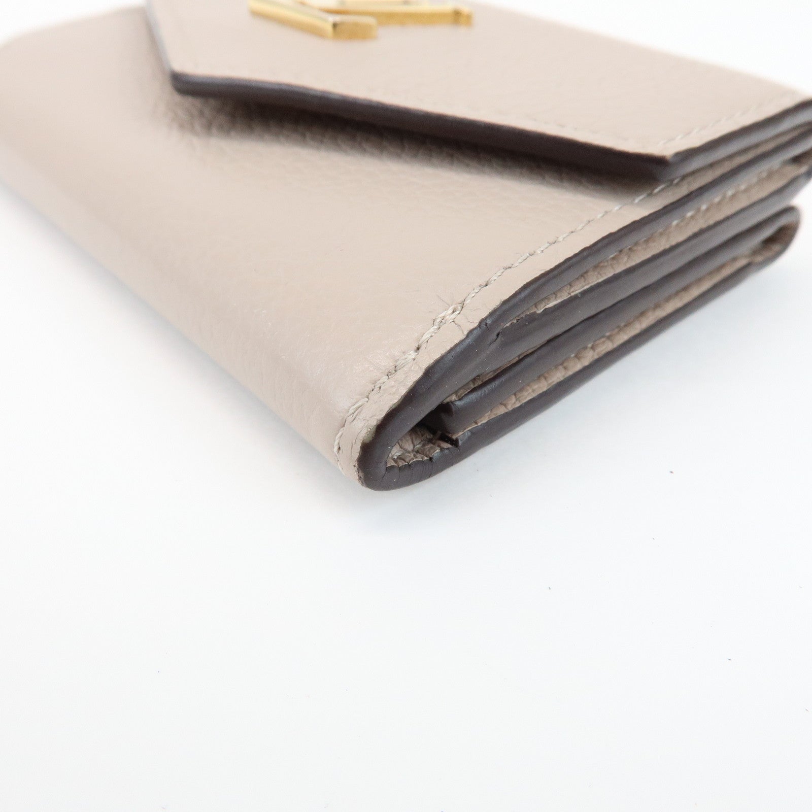 Louis Vuitton Torillon Portefeuille Lock Mini Wallet Greige M69340