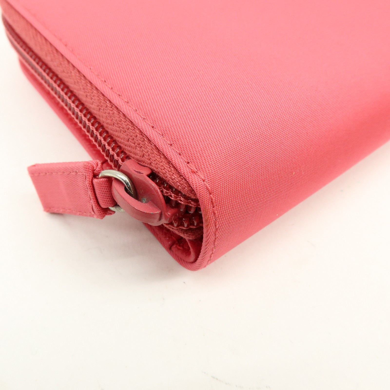 PRADA Triangle Logo Nylon Leather Round Zippy Compact Wallet Pink