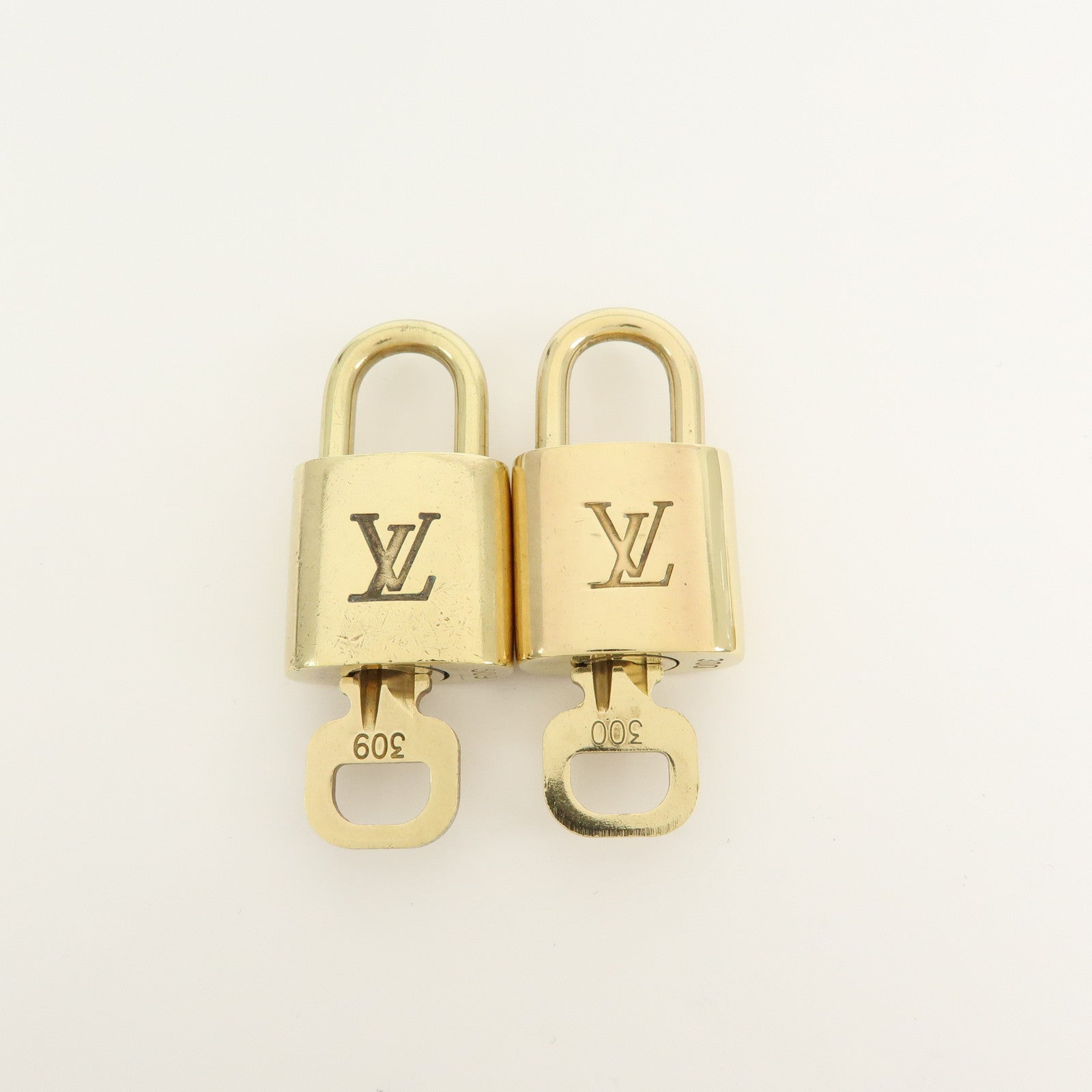 Louis Vuitton Set of 10 Lock & Key Cadena Key Lock Gold