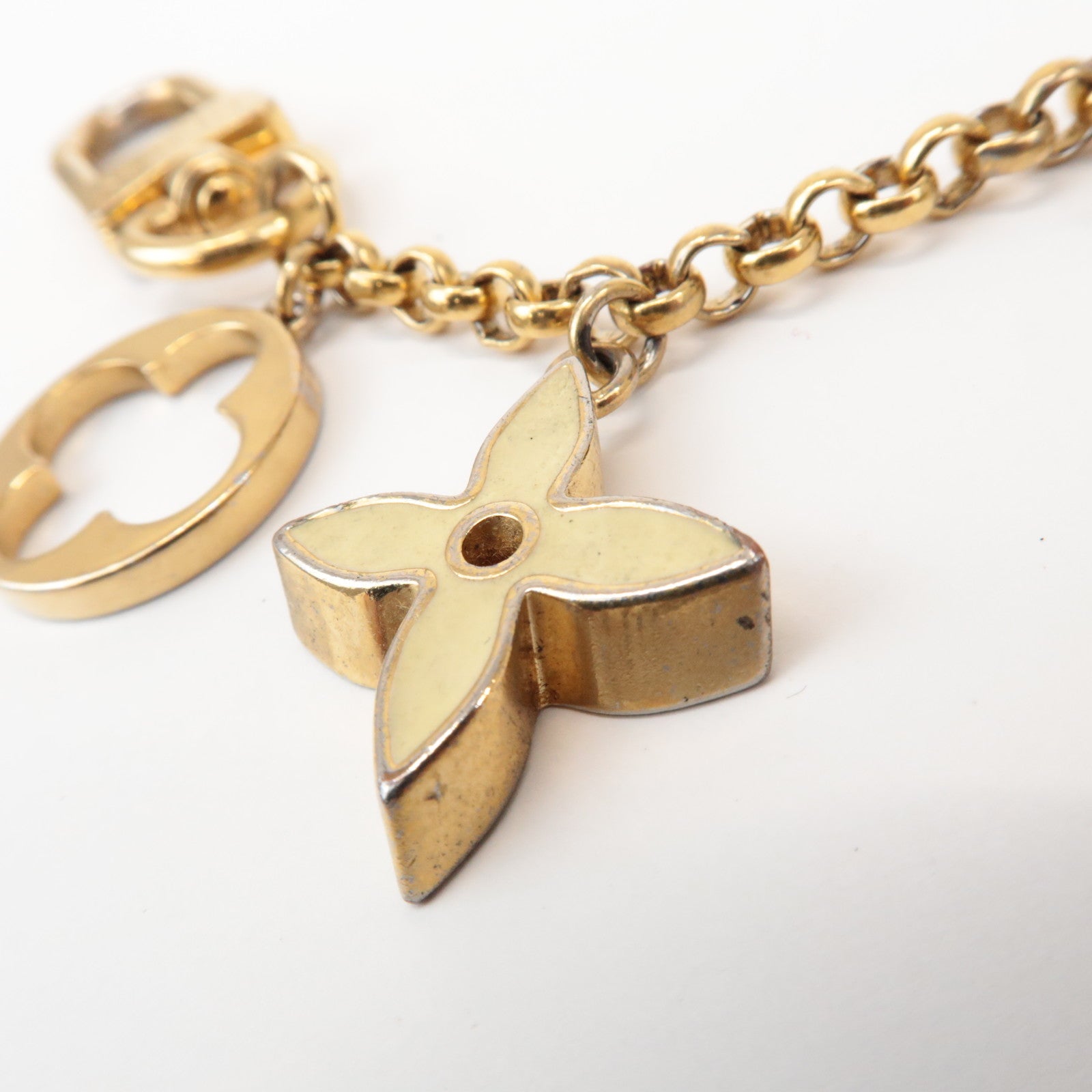 Louis Vuitton Fleur de Monogram Bag Charm Key Chain Gold M65111