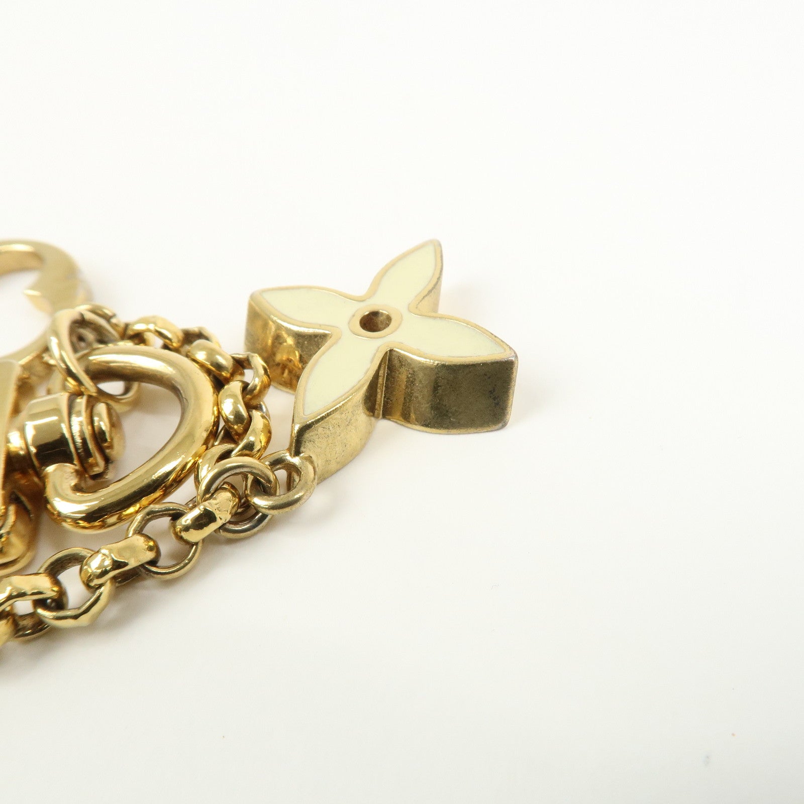 Louis Vuitton Fleur de Monogram Bag Charm Key Chain Gold M65111