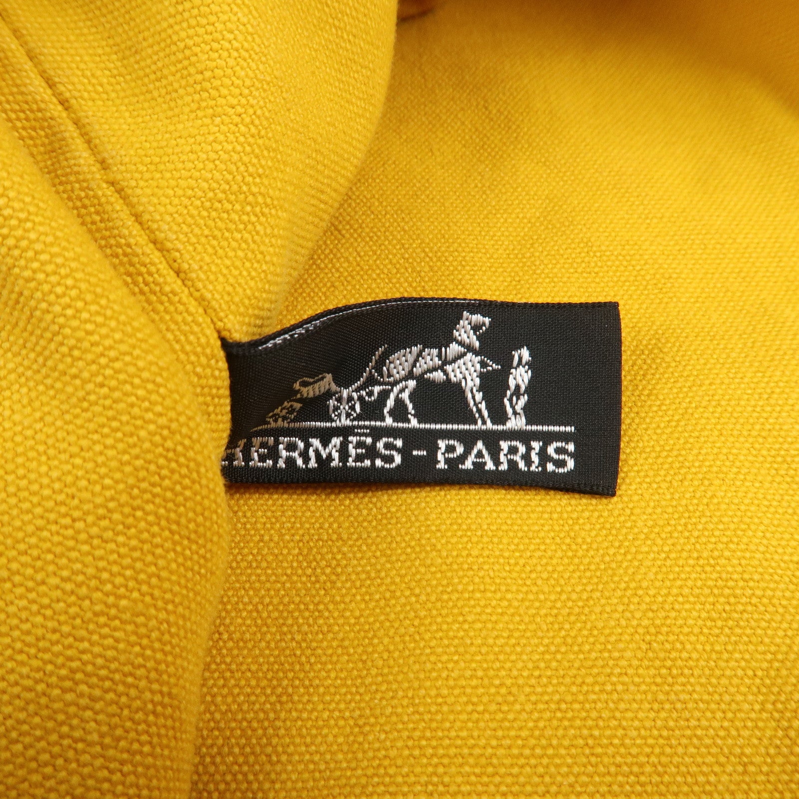 HERMES Canvas Leather Porochon Mimil PM Drawstring Backpack Yellow