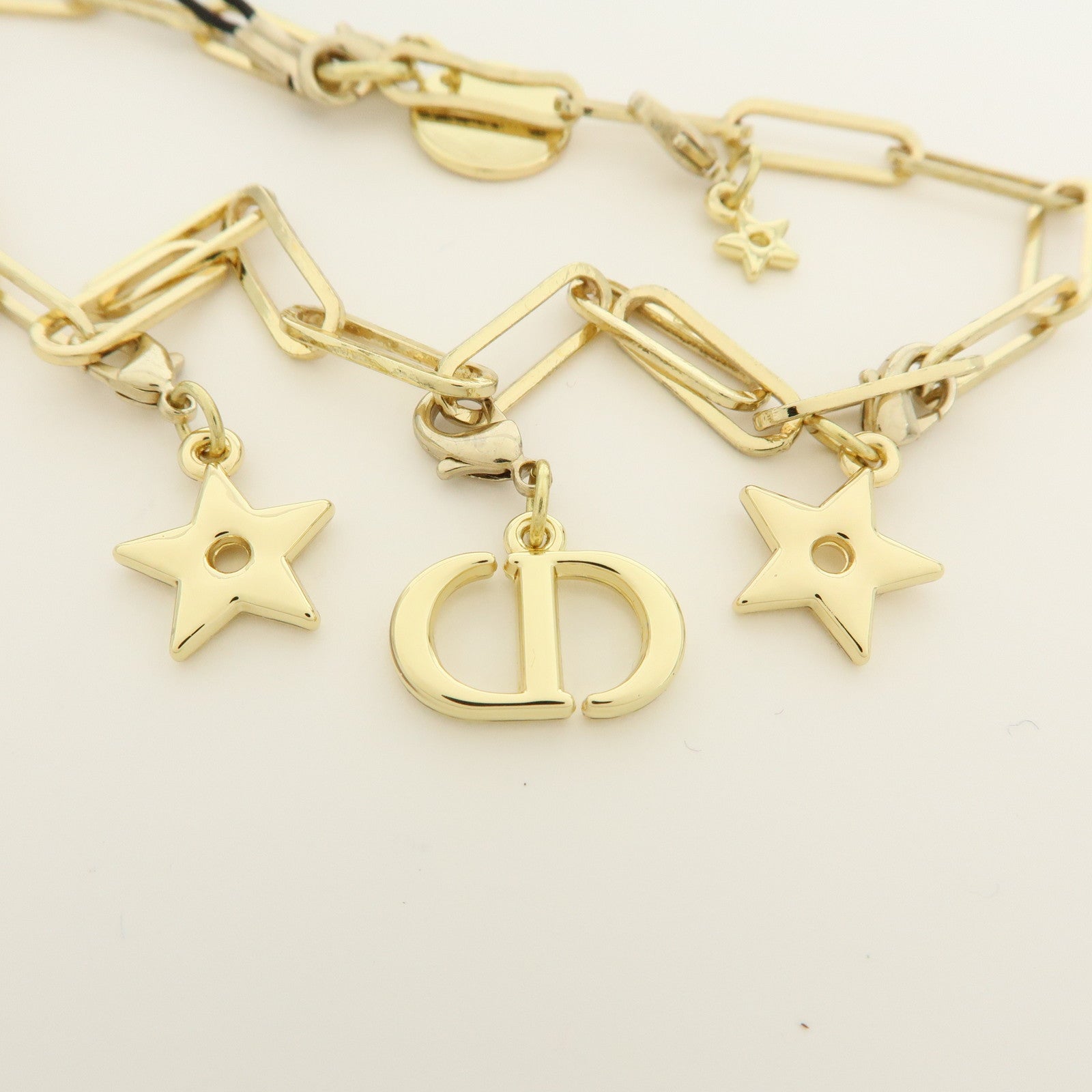 Christian Dior Star Motif CD Logo Metal Bag Charm Key Holder Gold