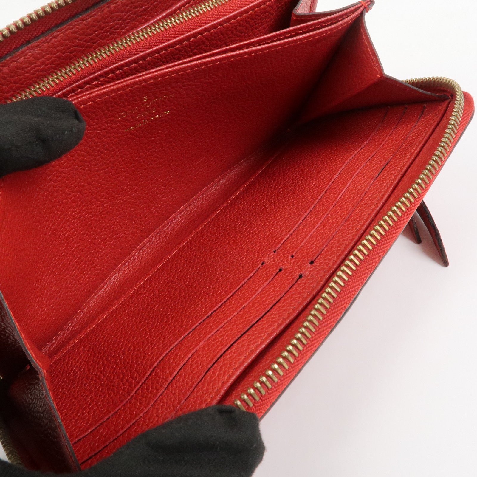 Louis Vuitton Monogram Empreinte Leather Round Zippy Wallet M68571
