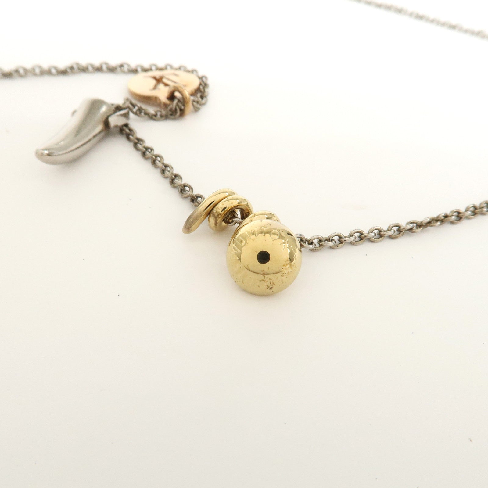 Louis Vuitton Metal LV Safari Charms Necklace Silver Gold M68106