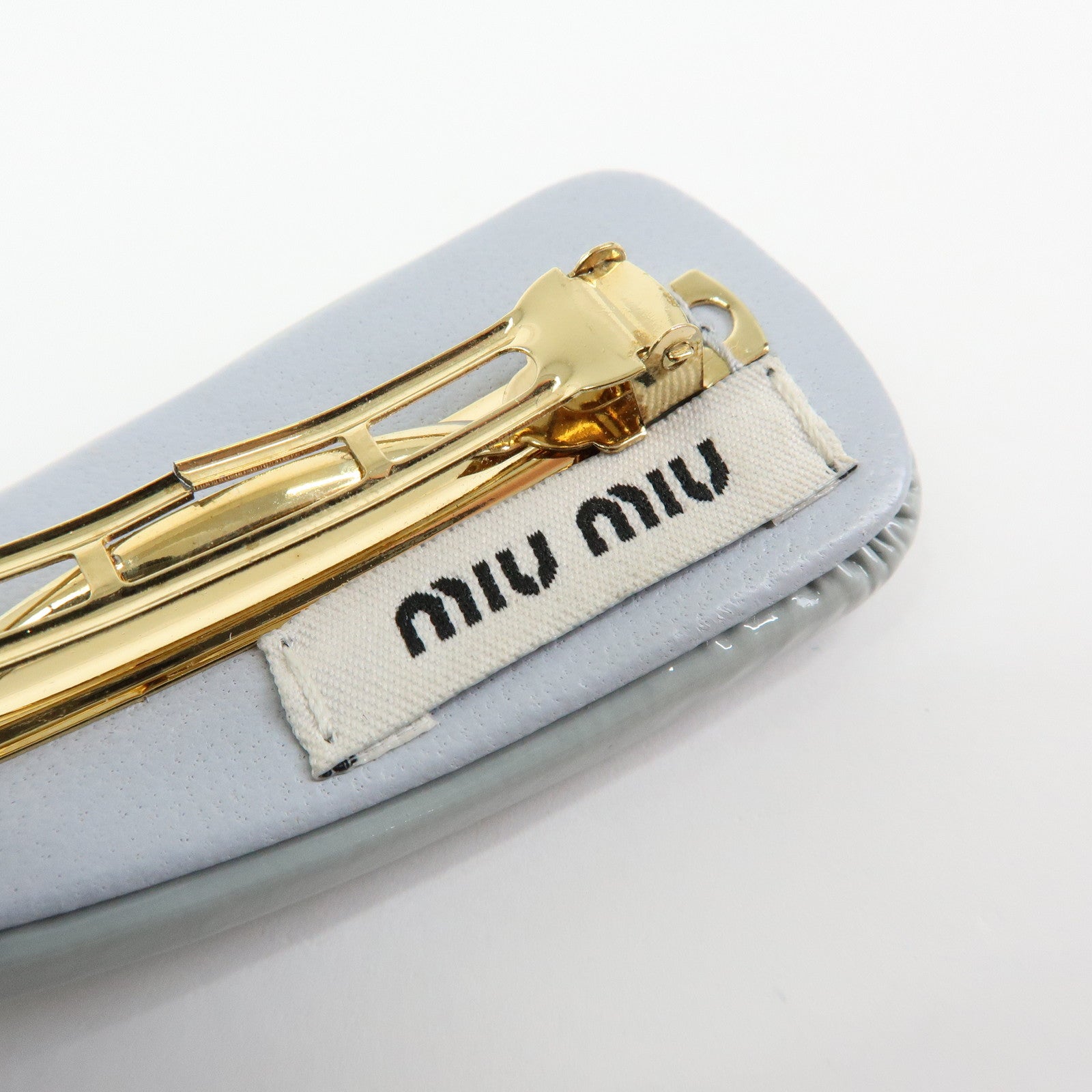 MIU MIU Logo Patent Leather Hair Clip Hair Accessory Gray 5IF092