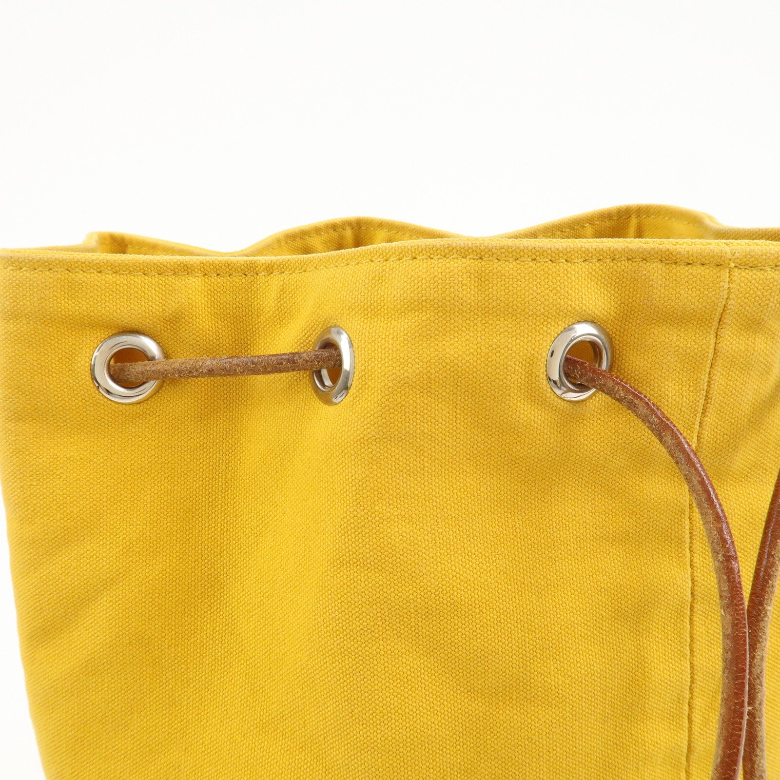HERMES Canvas Leather Porochon Mimil PM Drawstring Backpack Yellow