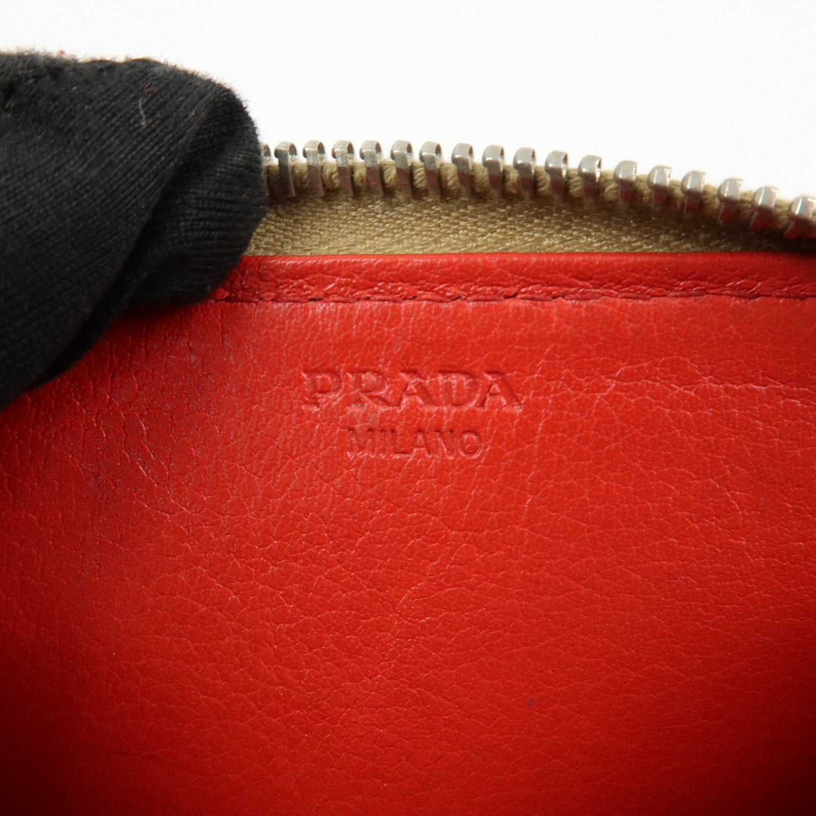 PRADA Triangle Logo Punched Leather Round Zippy Coin Case Red