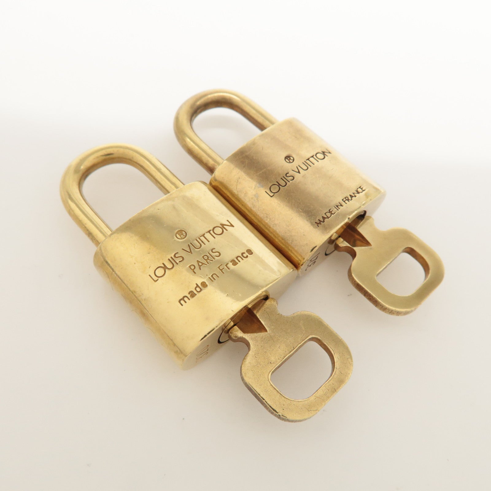 Louis Vuitton Set of 10 Lock & Key Cadena Key Lock Metal Gold
