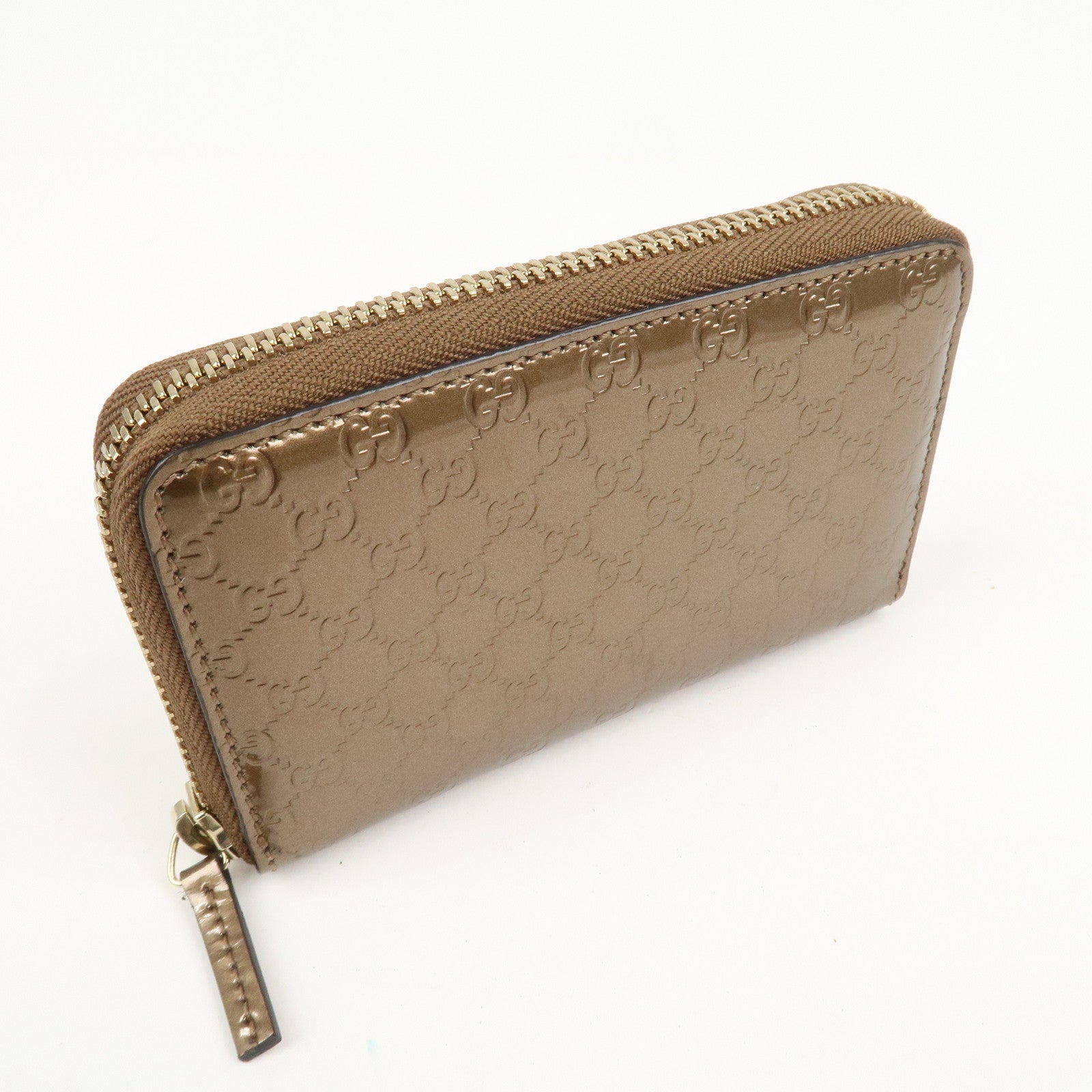 GUCCI Micro Guccissima Leather Zippy Wallet Card Case Bronze 255452