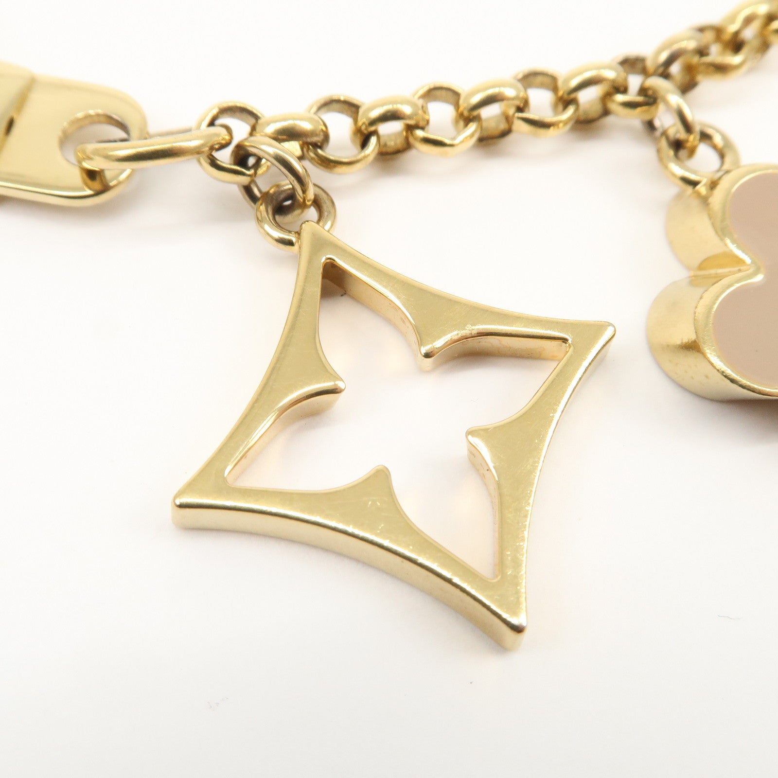 Louis Vuitton Fleur de Monogram Bag Charm Key Chain Gold M65111