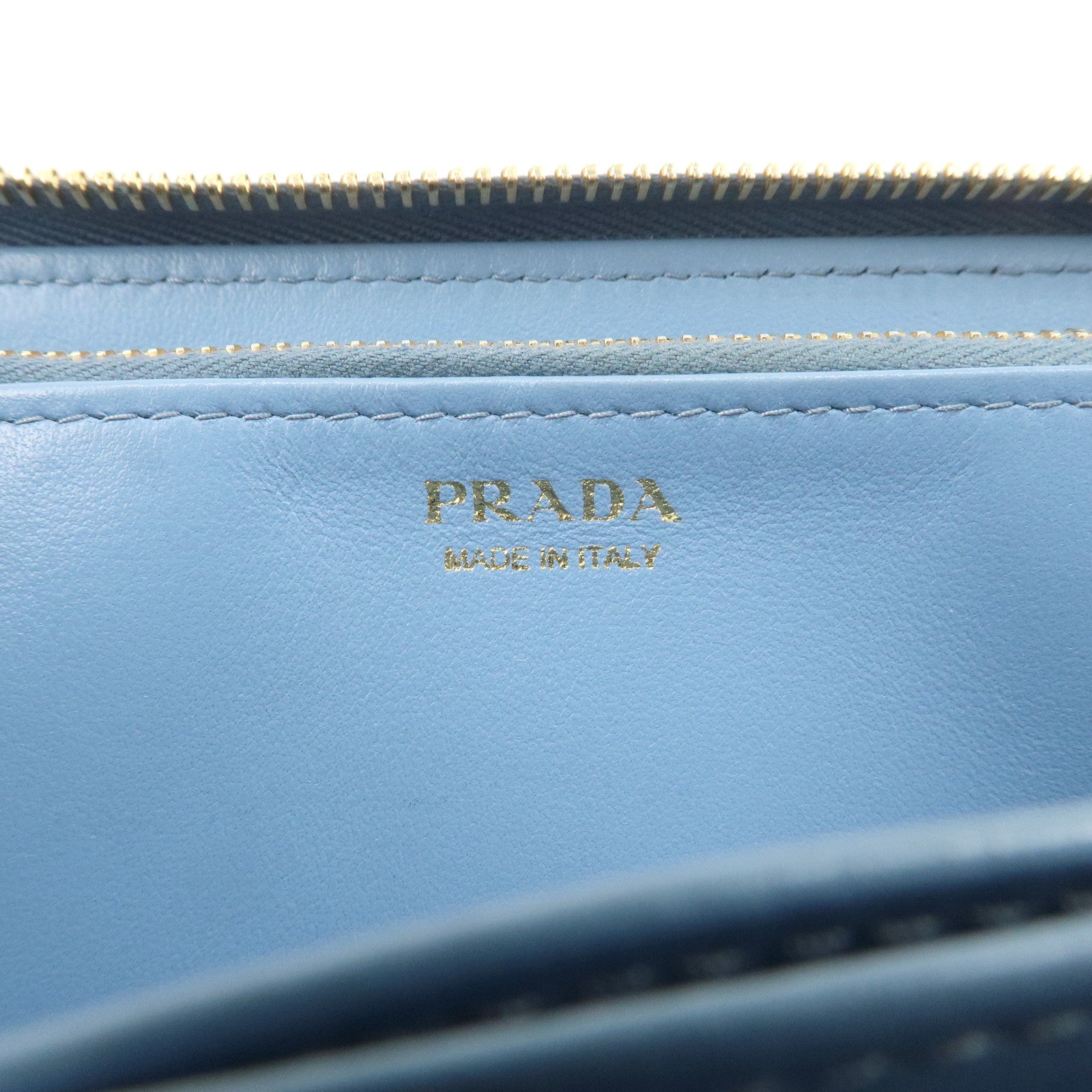 PRADA Logo Vitello Move Leather Zippy Long Wallet Light Blue 1ML506