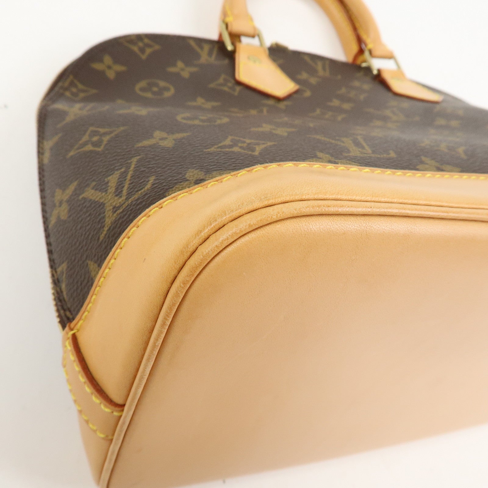 Louis Vuitton Monogram Alma Hand Bag Brown M51130