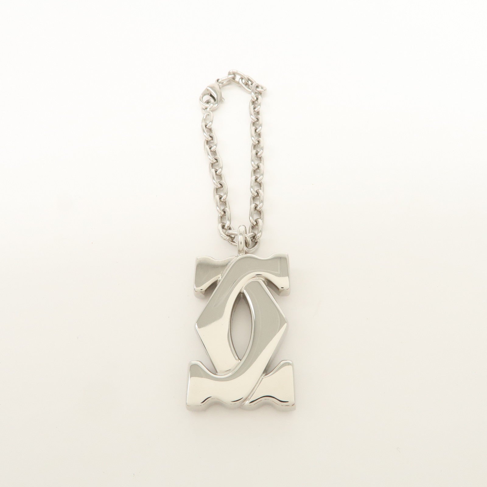 Cartier Must Line Logo Metal Bag Charm Key Charm Silver