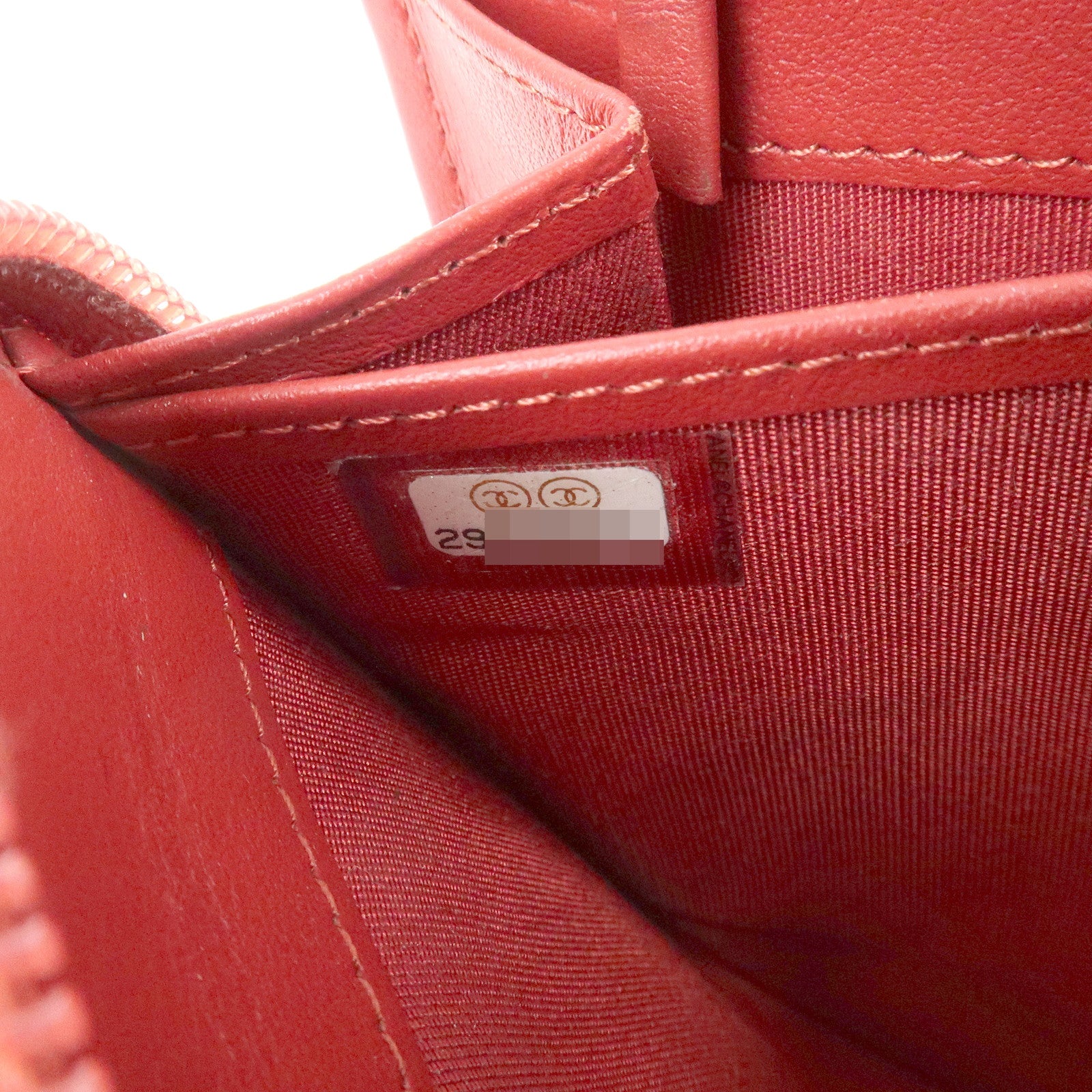 CHANEL BOY CHANEL Caviarskin Round Zippy Wallet Red Gold A68912