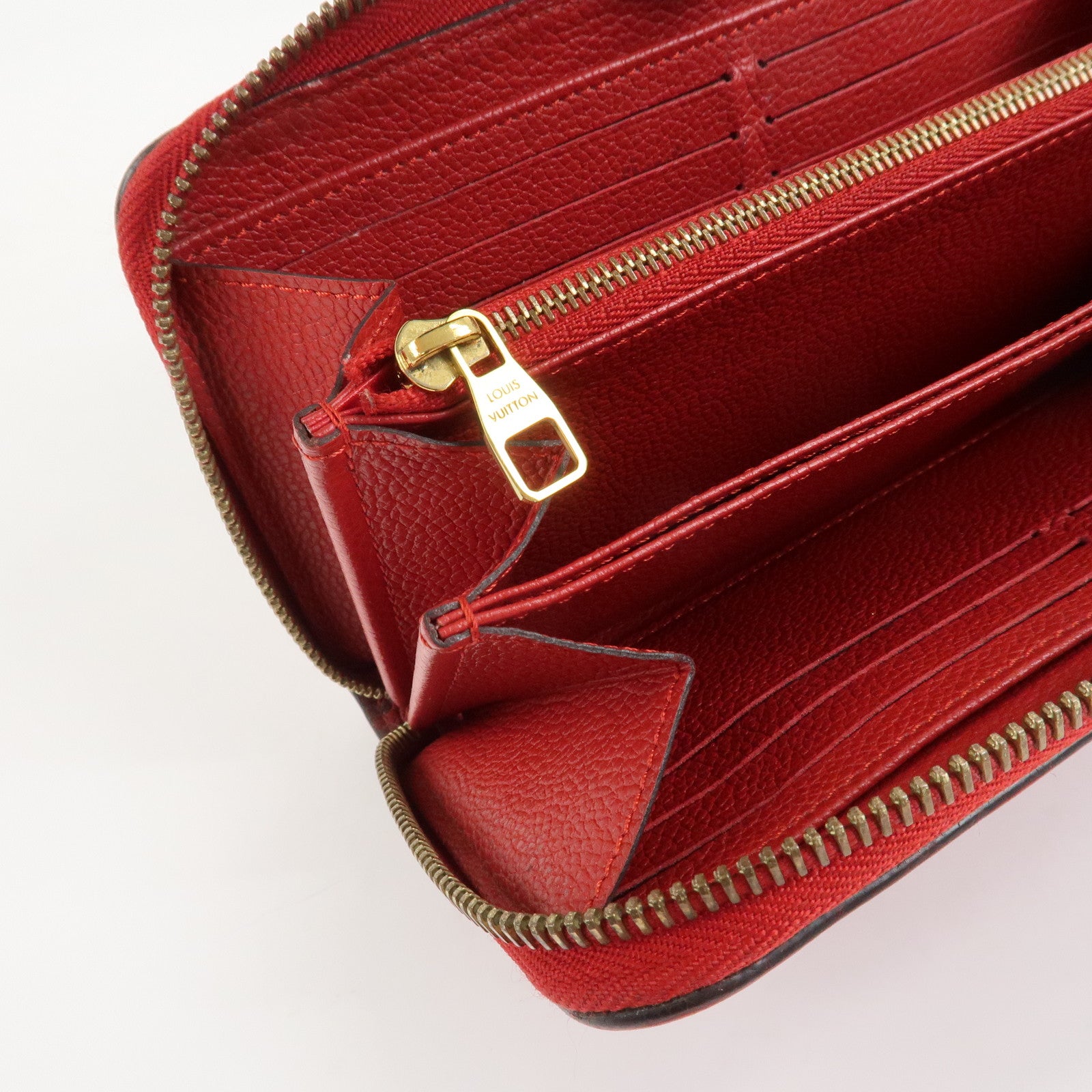 Louis Vuitton Monogram Empreinte Leather Round Zippy Wallet M68571
