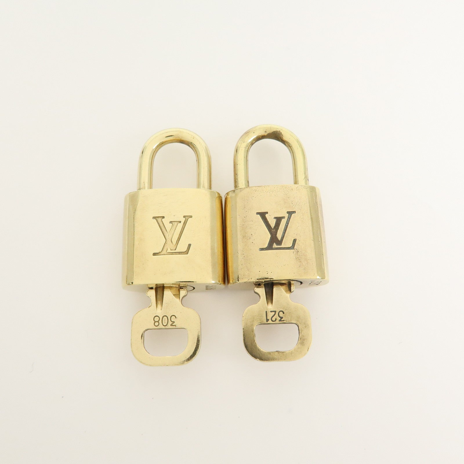 Louis Vuitton Set of 10 Lock & Key Cadena Key Lock Gold