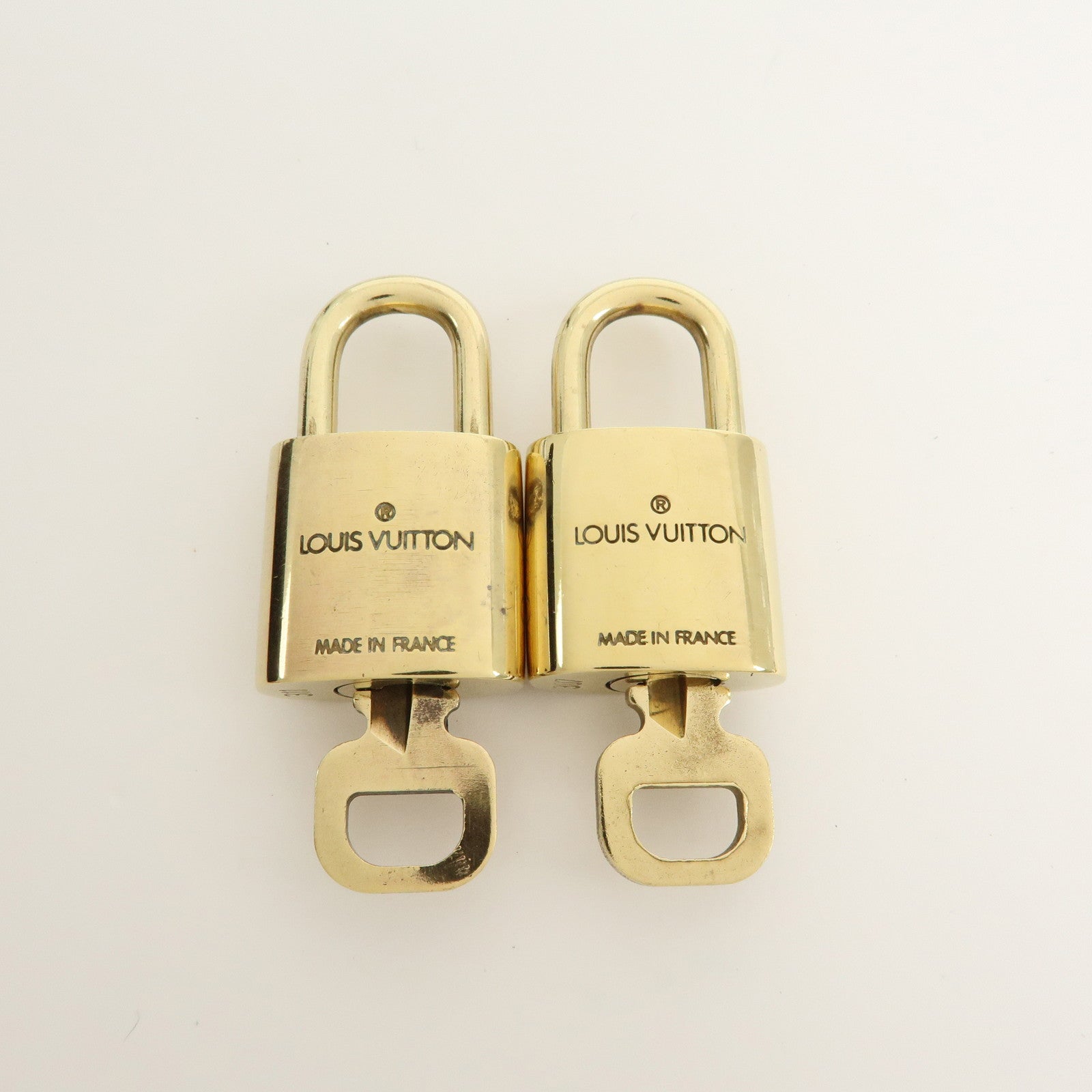 Louis Vuitton Set of 10 Lock & Key Cadena Key Lock Gold