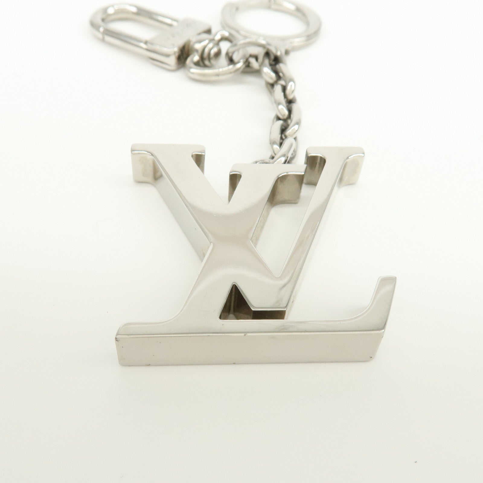 Louis Vuitton Porte Cles Initials LV Metal Bag Charm Silver M65071