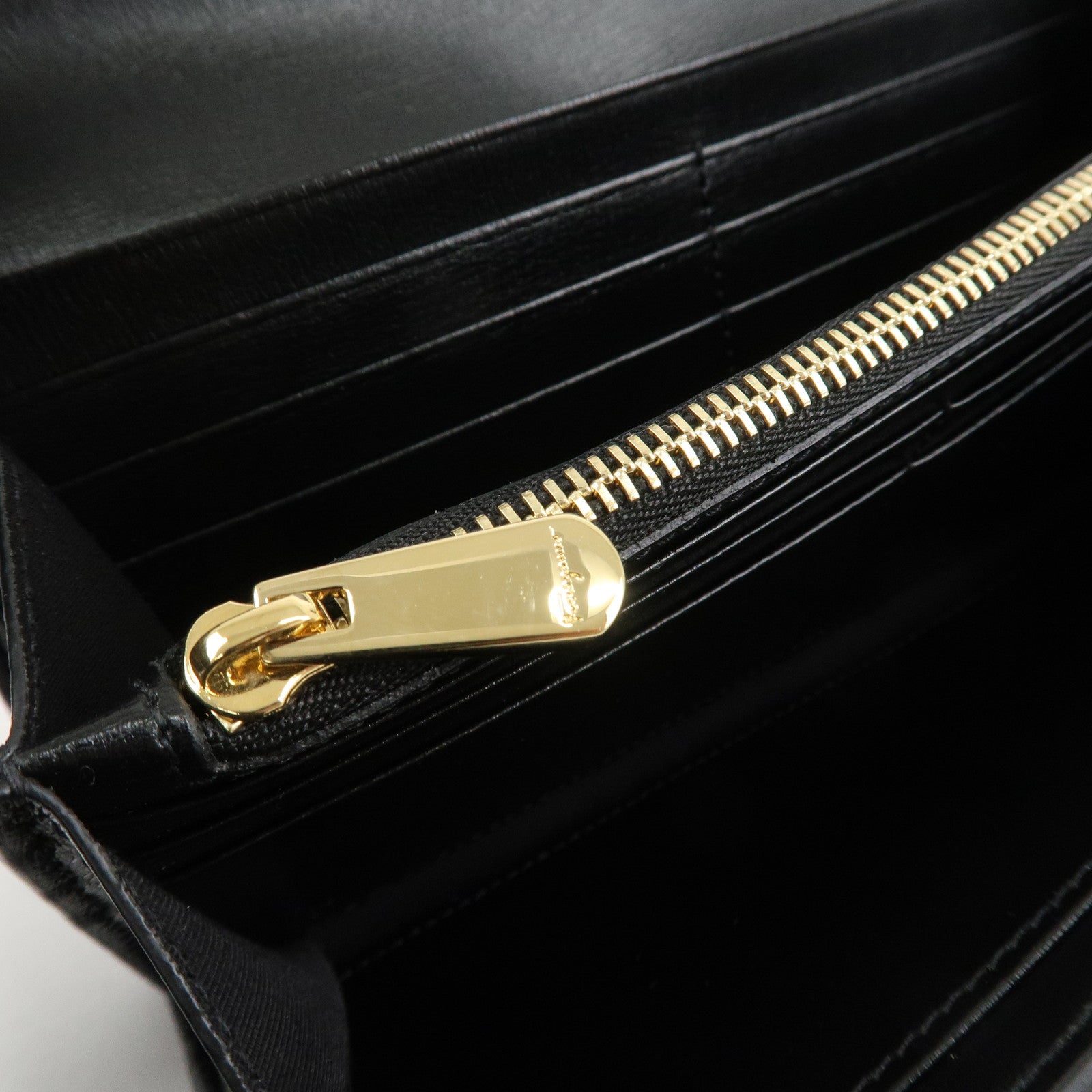 Ferragamo Vara Ribbon Leather Bifold Wallet Black Gold HDW Used