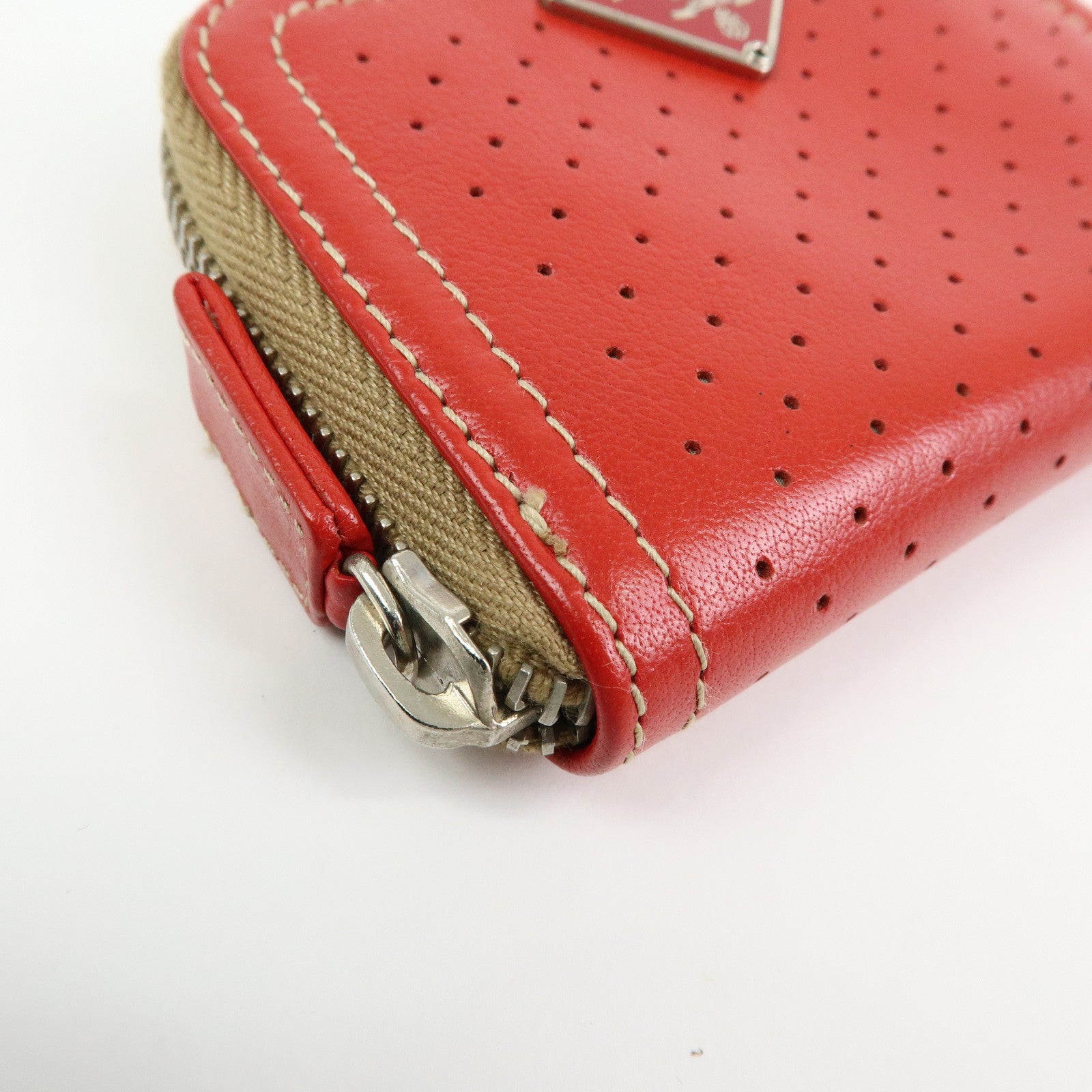 PRADA Triangle Logo Punched Leather Round Zippy Coin Case Red