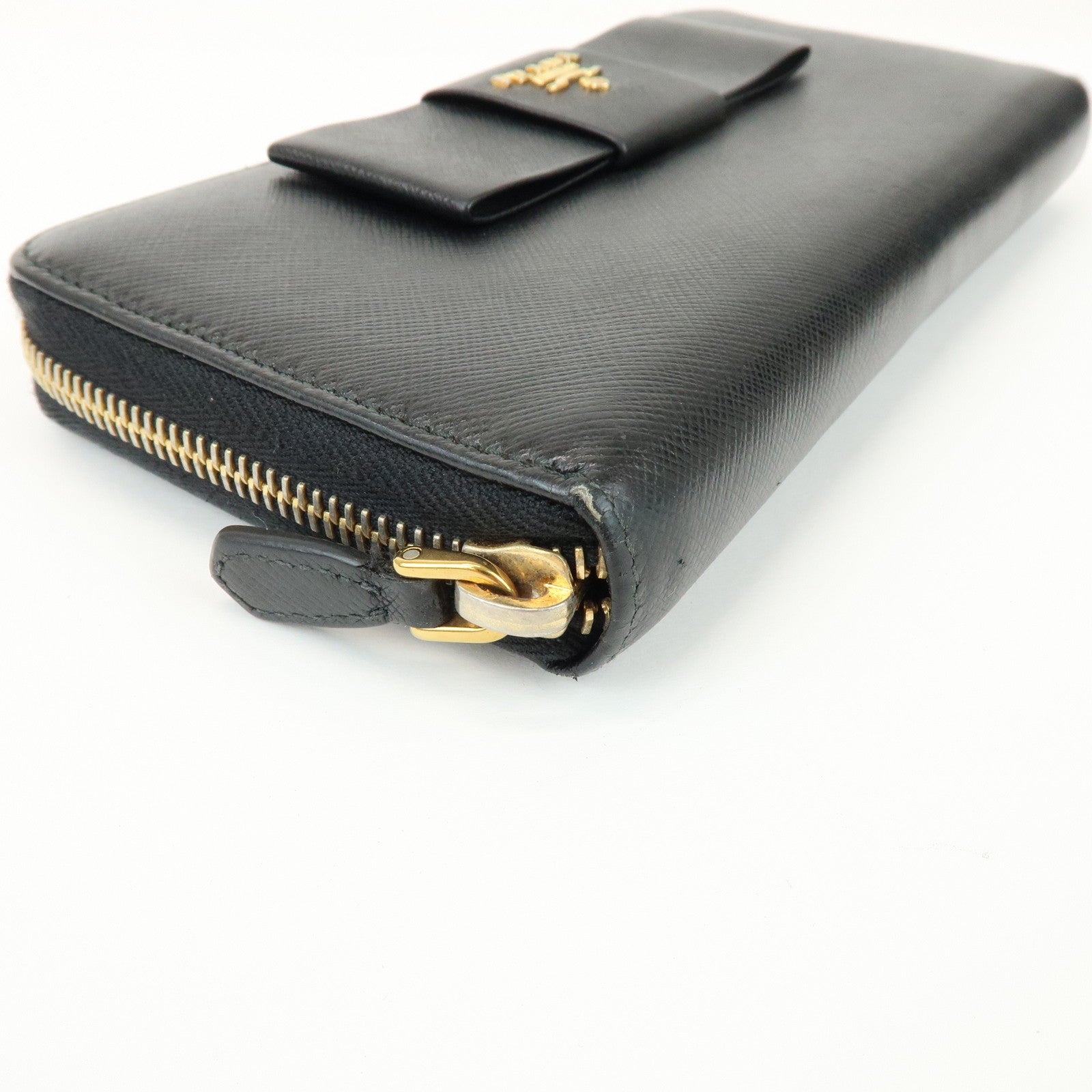 PRADA Saffiano Leather Ribbon Round Zippy Wallet Black 1M0506