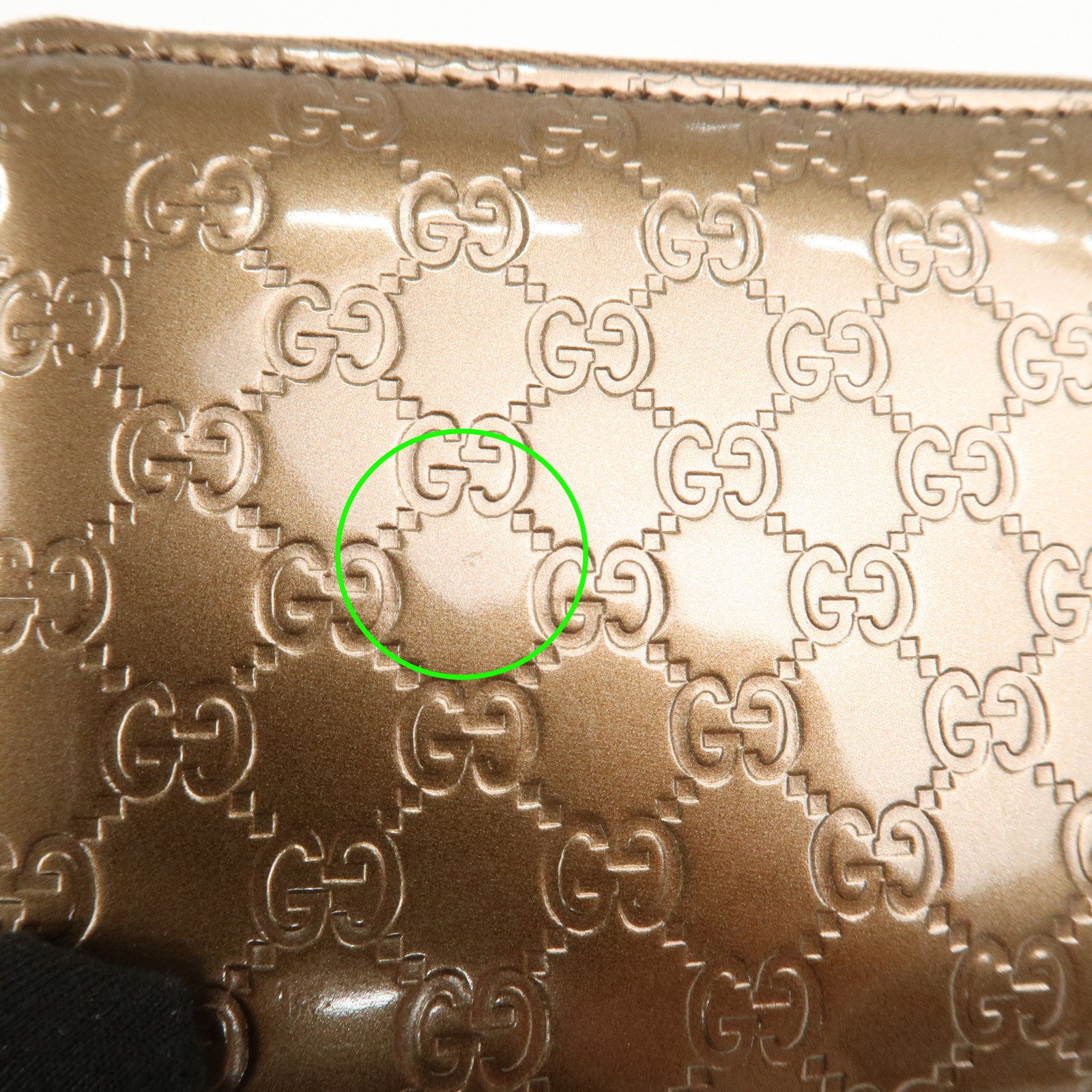 GUCCI Micro Guccissima Leather Zippy Wallet Card Case Bronze 255452