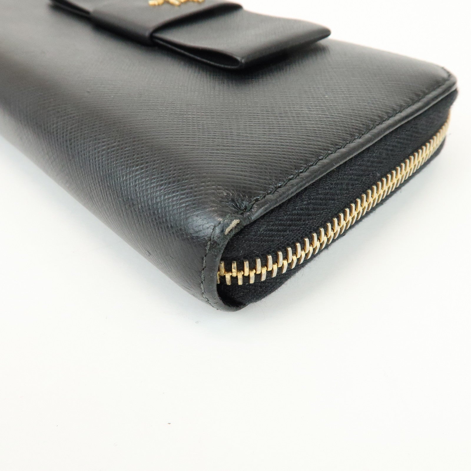 PRADA Saffiano Leather Ribbon Round Zippy Wallet Black 1M0506
