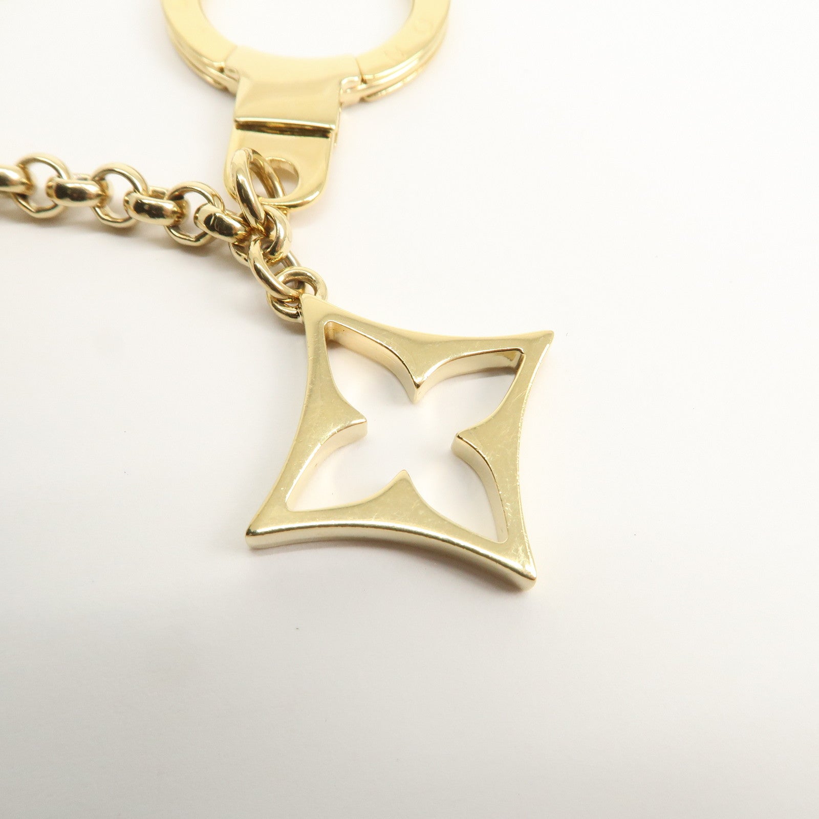 Louis Vuitton Fleur de Monogram Bag Charm Key Chain Gold M65111