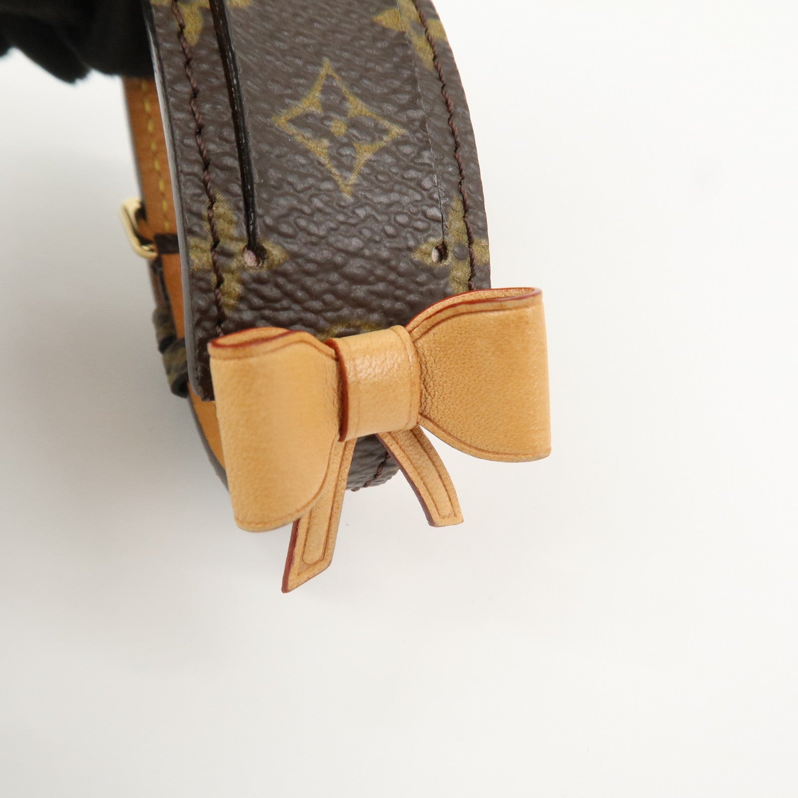 Louis Vuitton Monogram Porte Address Bracelet Brown M92577