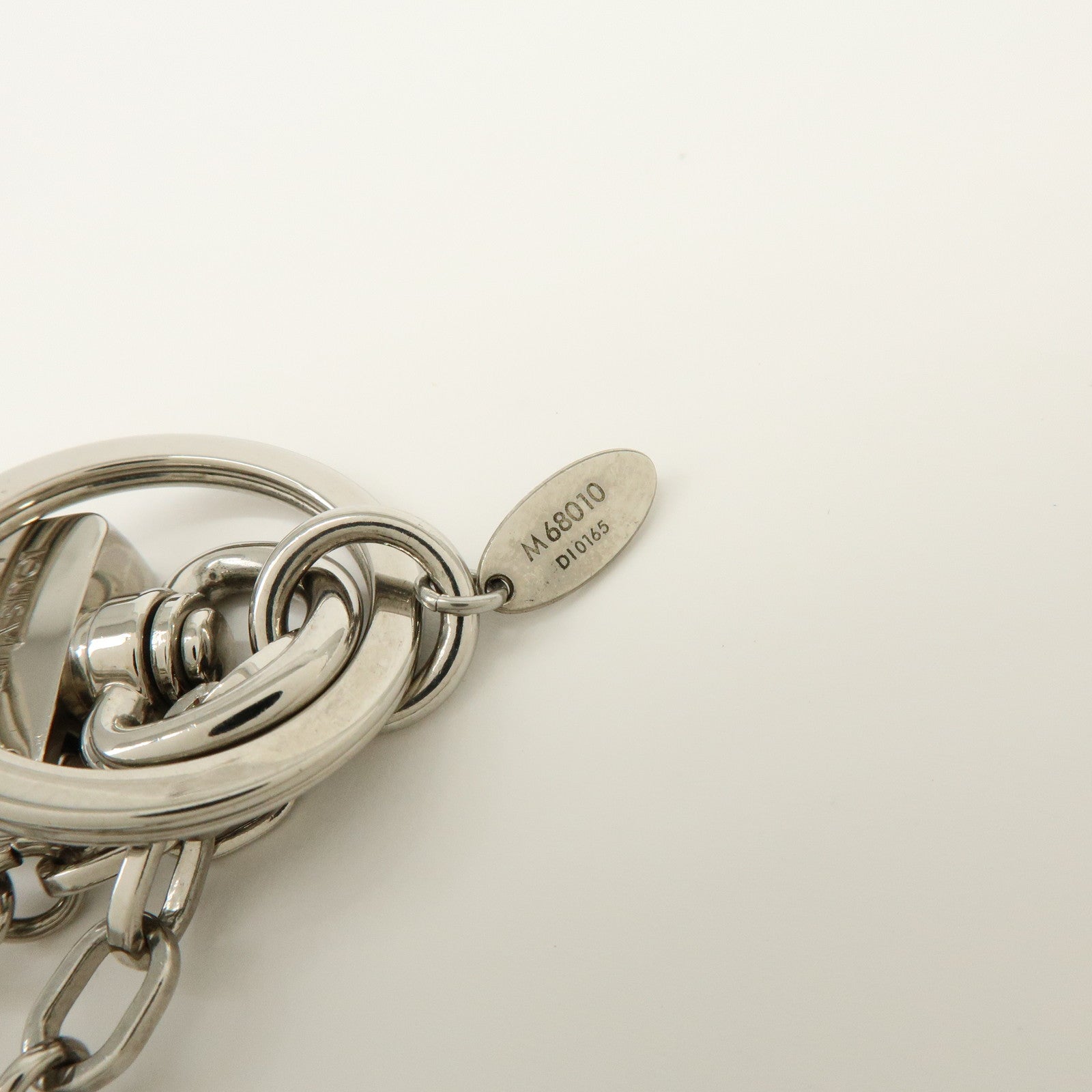 Louis Vuitton Twist Metal Bag Charm Key Holder Silver White M68010