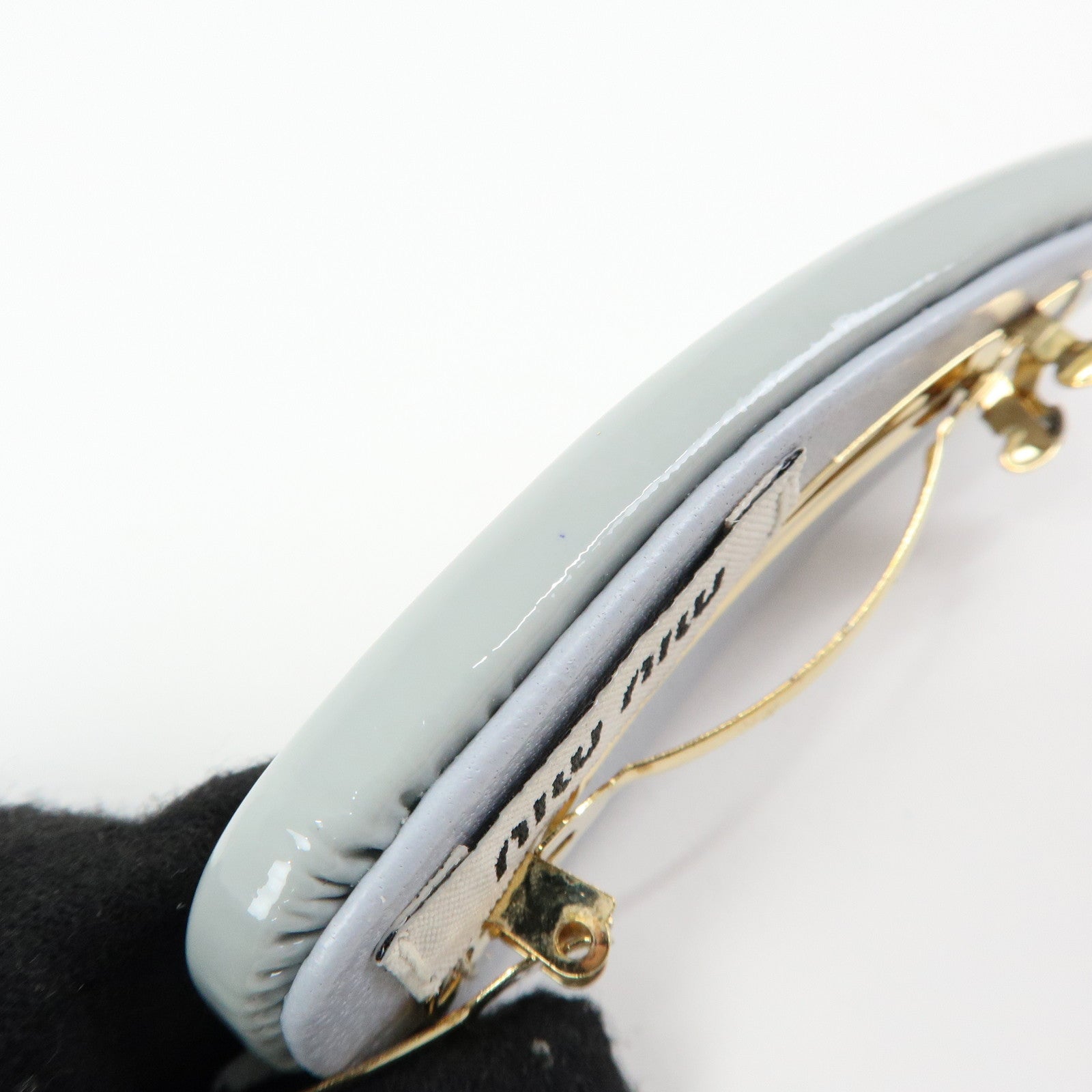 MIU MIU Logo Patent Leather Hair Clip Hair Accessory Gray 5IF092