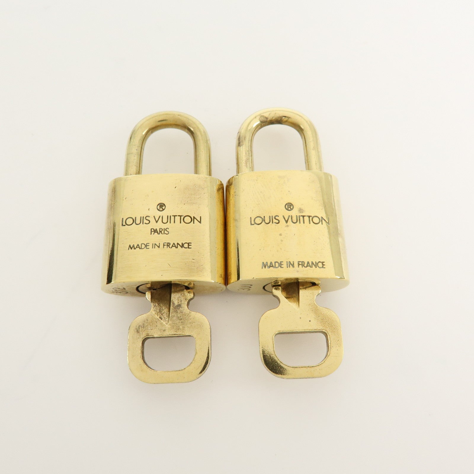 Louis Vuitton Set of 10 Lock & Key Cadena Key Lock Gold