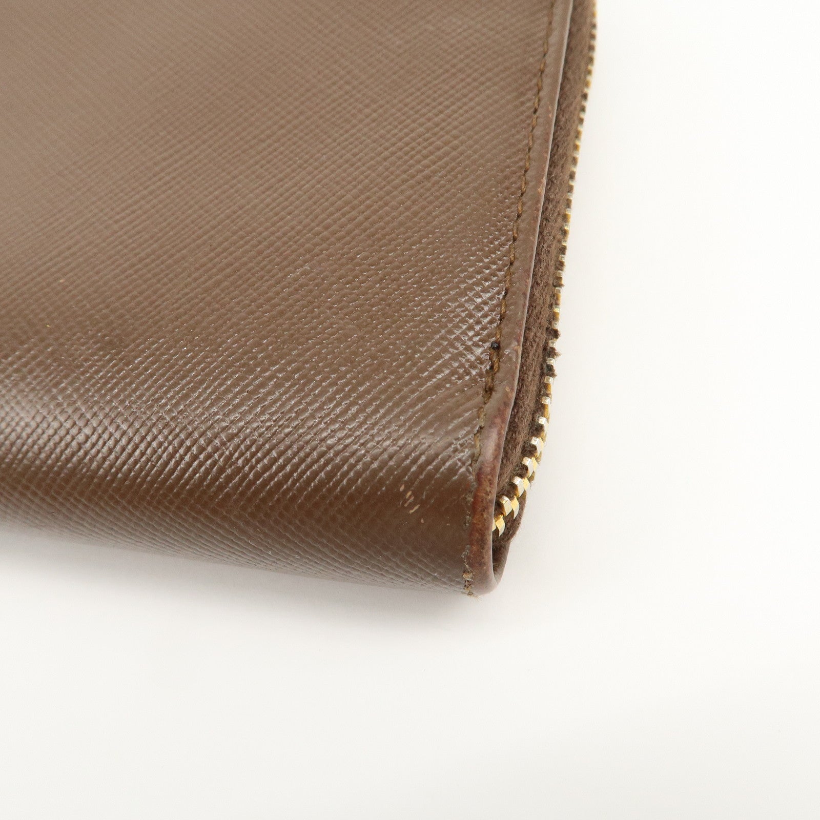 PRADA Triangle Logo Saffiano Leather Round Zippy Wallet 1M0506
