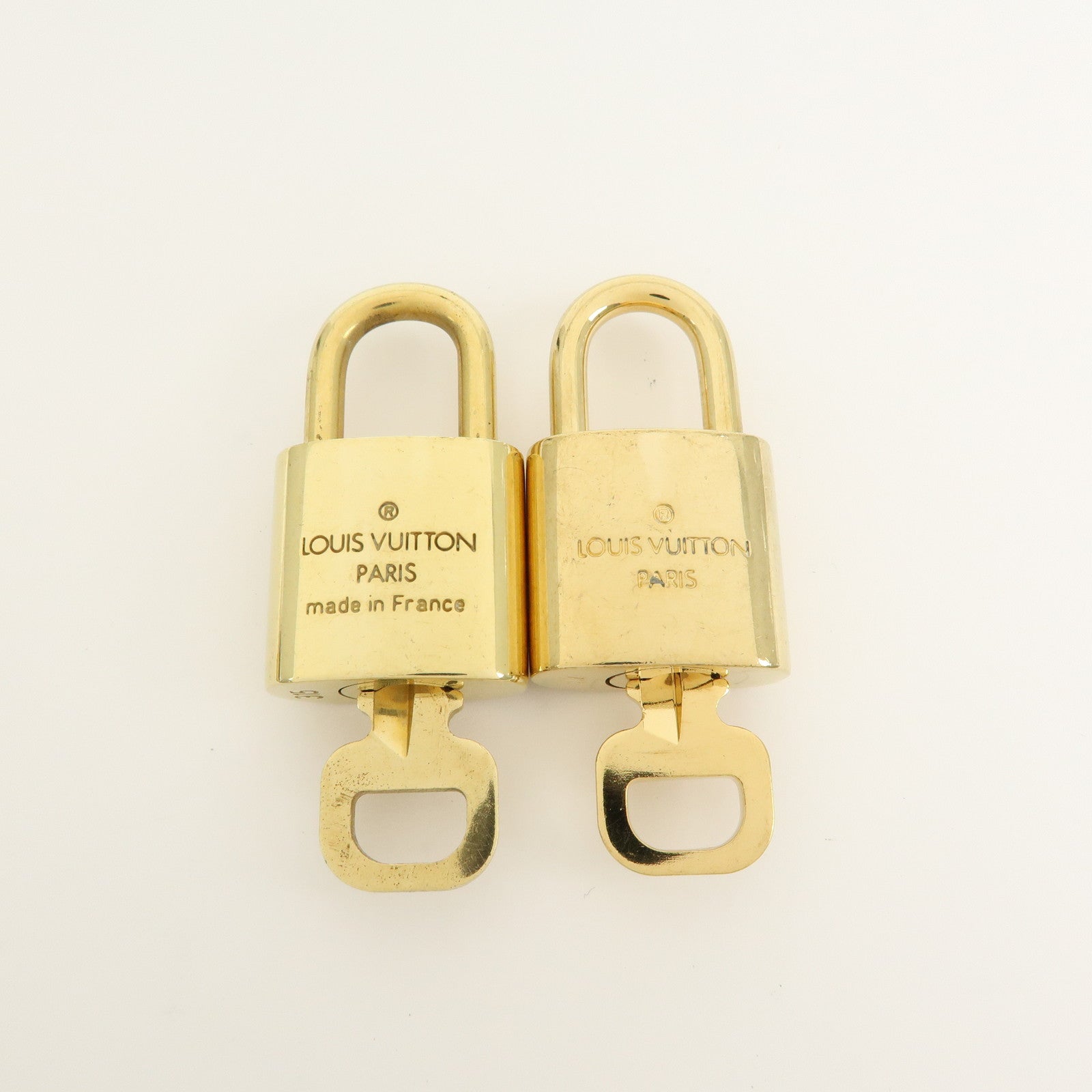 Louis Vuitton Set of 10 Lock & Key Cadena Key Lock Gold