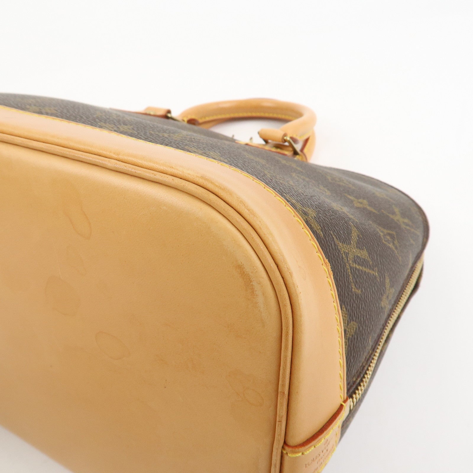 Louis Vuitton Monogram Alma Hand Bag Brown M51130