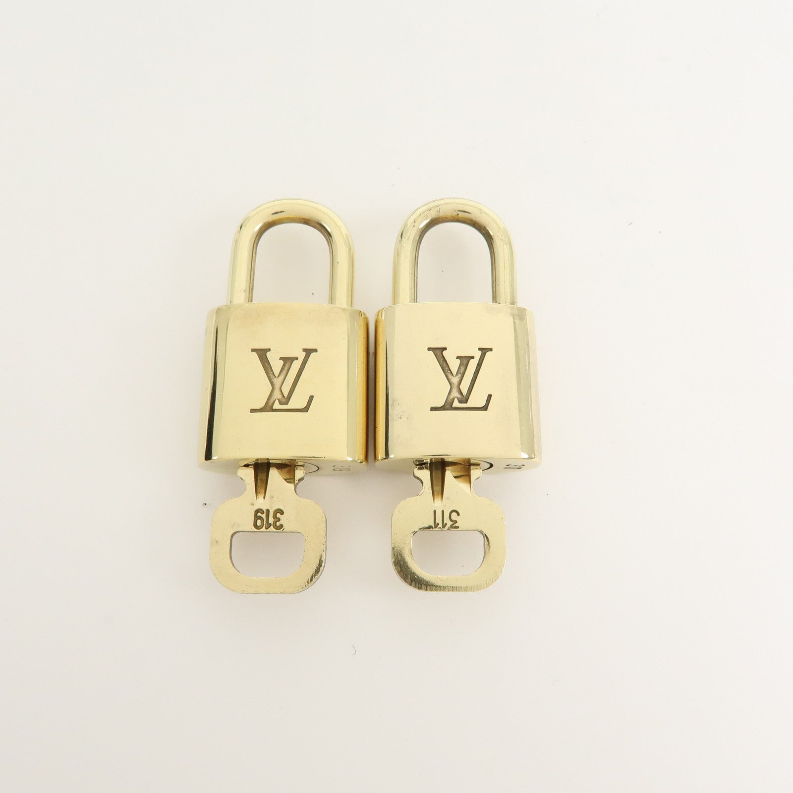 Louis Vuitton Set of 10 Lock & Key Cadena Key Lock Gold