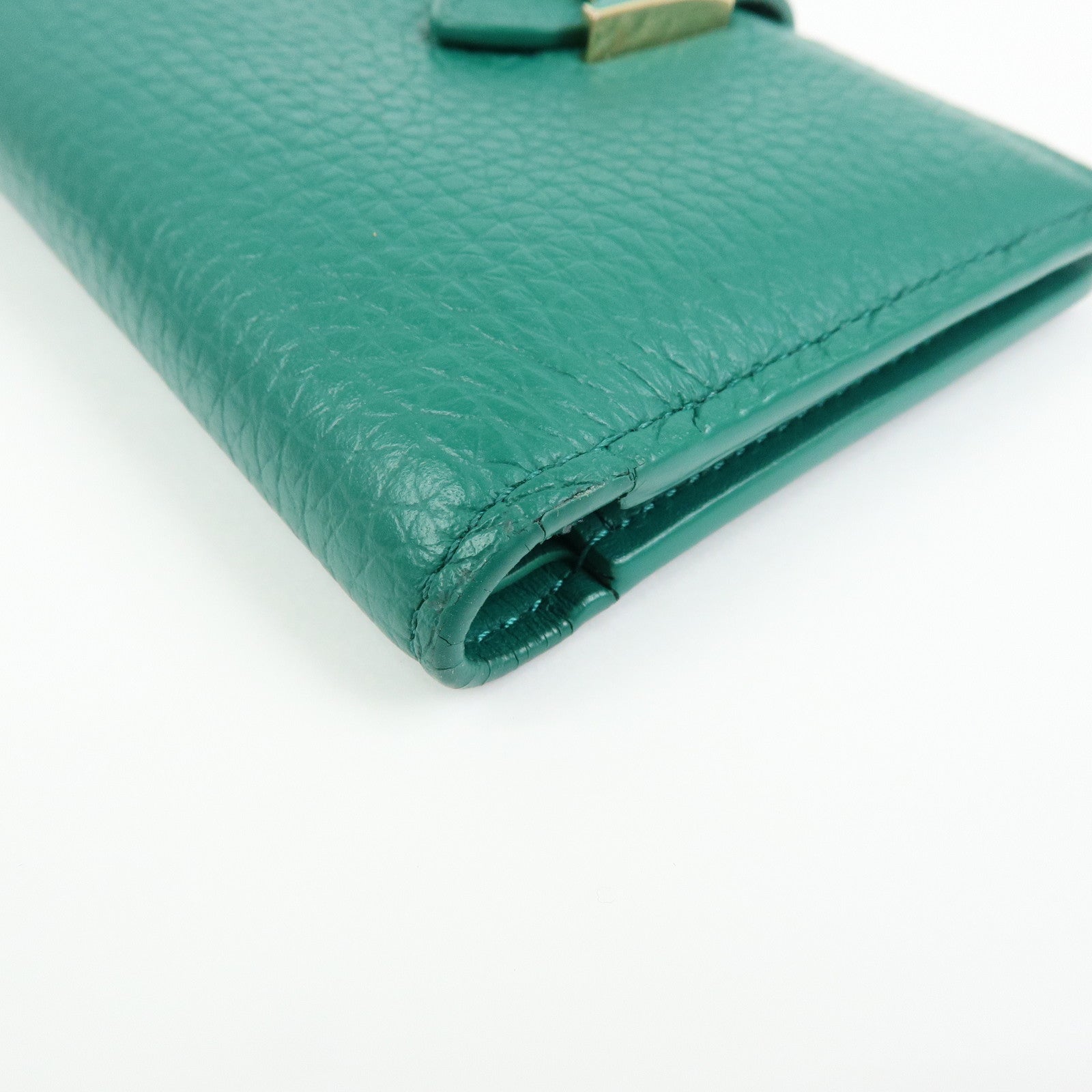 Louis Vuitton Taurillon Leather Vertical Compact Wallet M82438