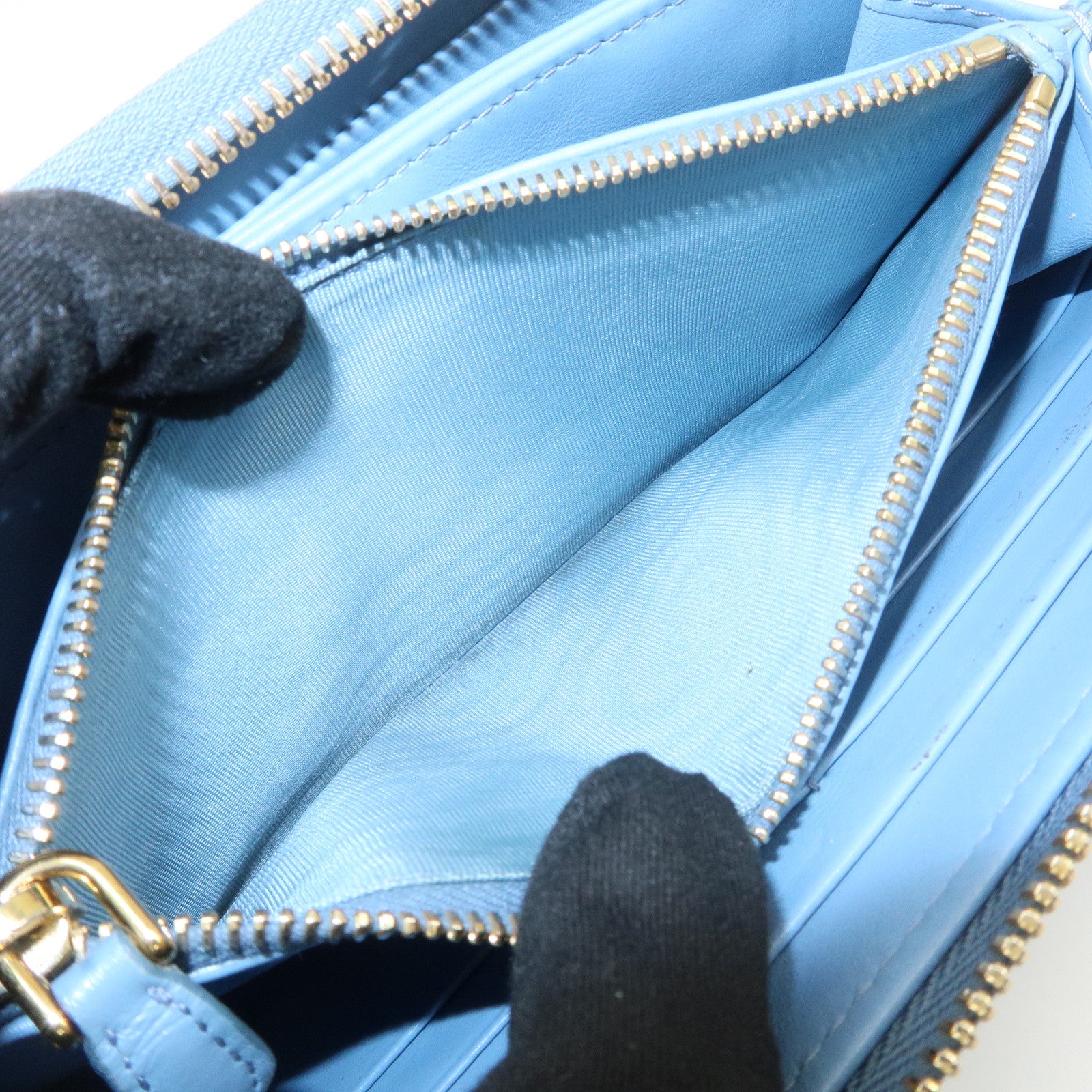 PRADA Logo Vitello Move Leather Zippy Long Wallet Light Blue 1ML506