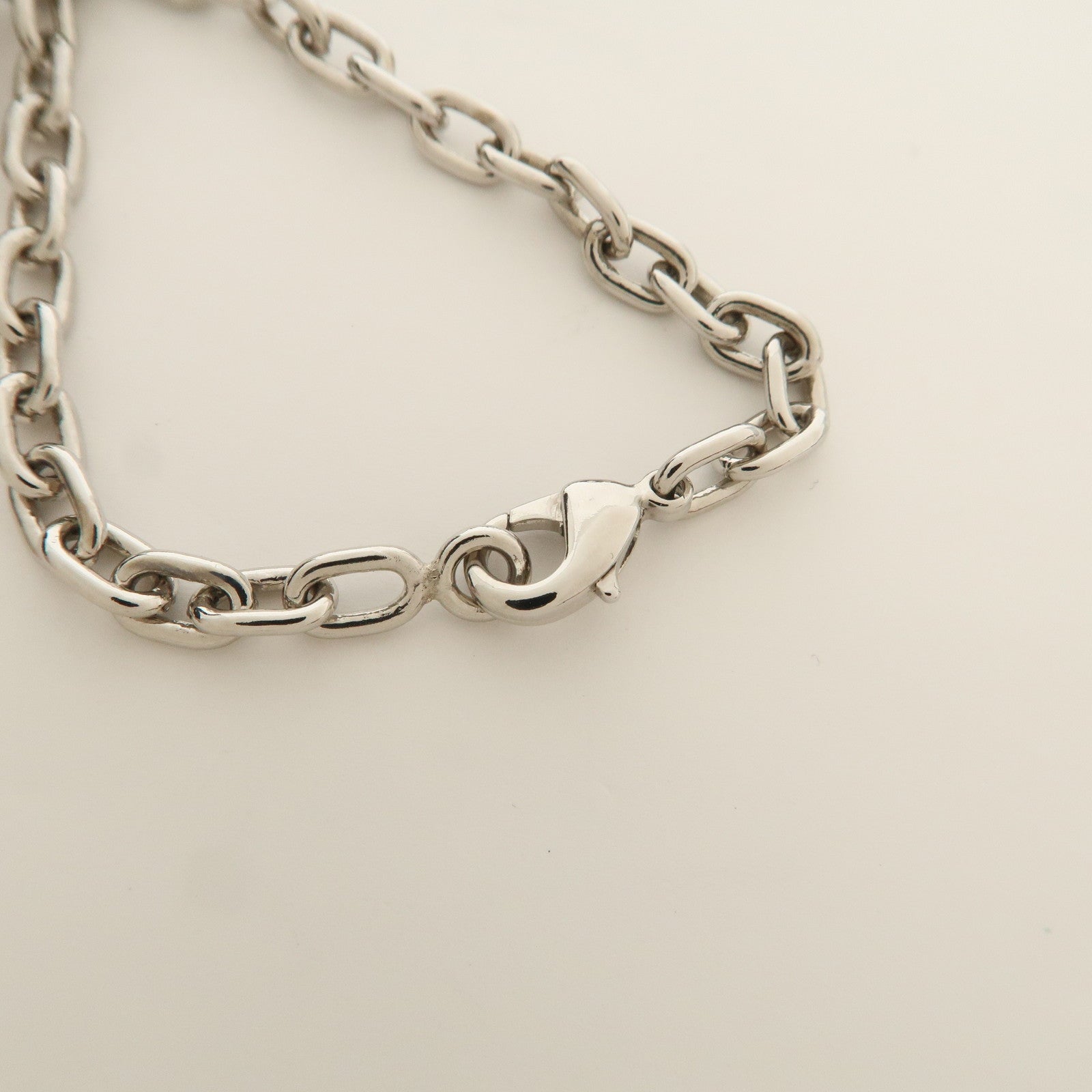 Cartier Must Line Logo Metal Bag Charm Key Charm Silver