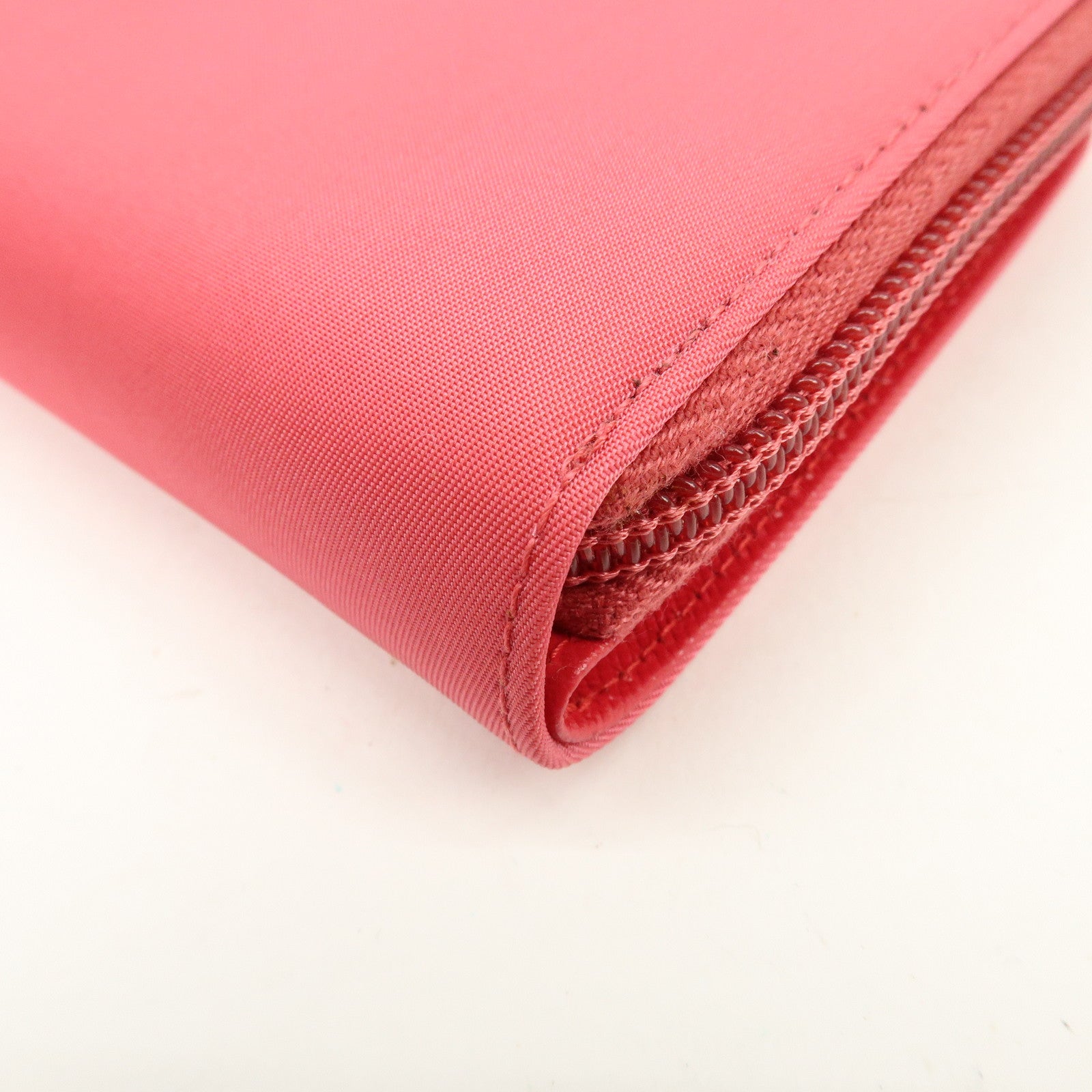 PRADA Triangle Logo Nylon Leather Round Zippy Compact Wallet Pink