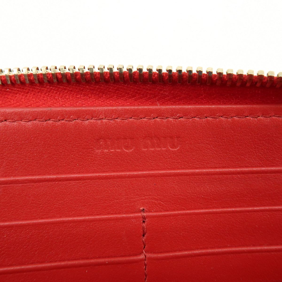 MIU MIU Patent Embossed Leather Round Zippy Long Wallet Red 5ML506