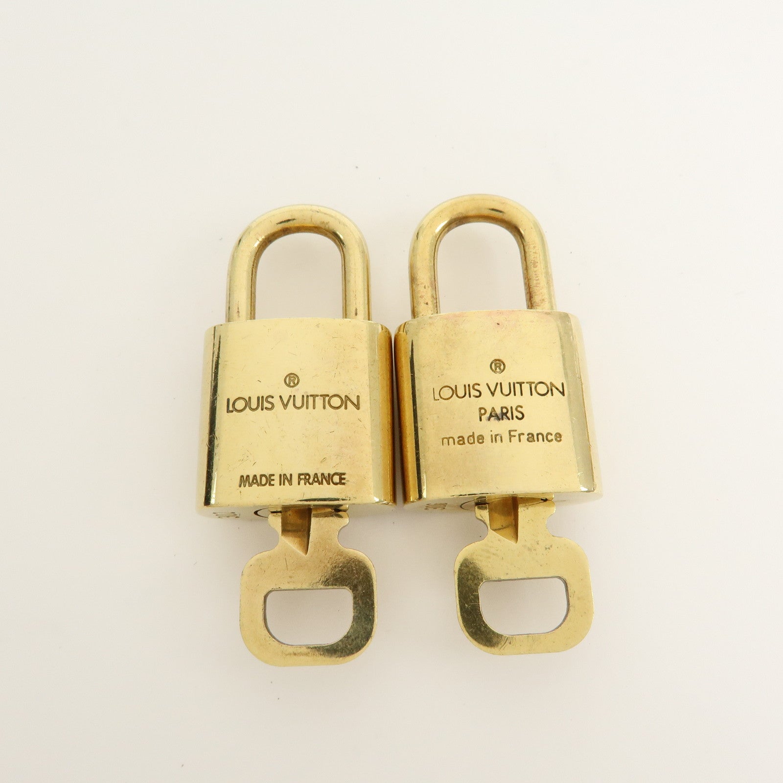 Louis Vuitton Set of 10 Lock & Key Cadena Key Lock Gold