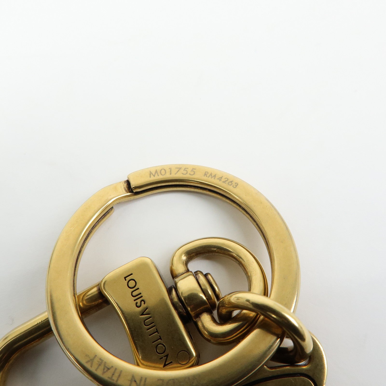 Louis Vuitton LV Lovers Studs Metal Bag Charm Key Chain Gold M01755
