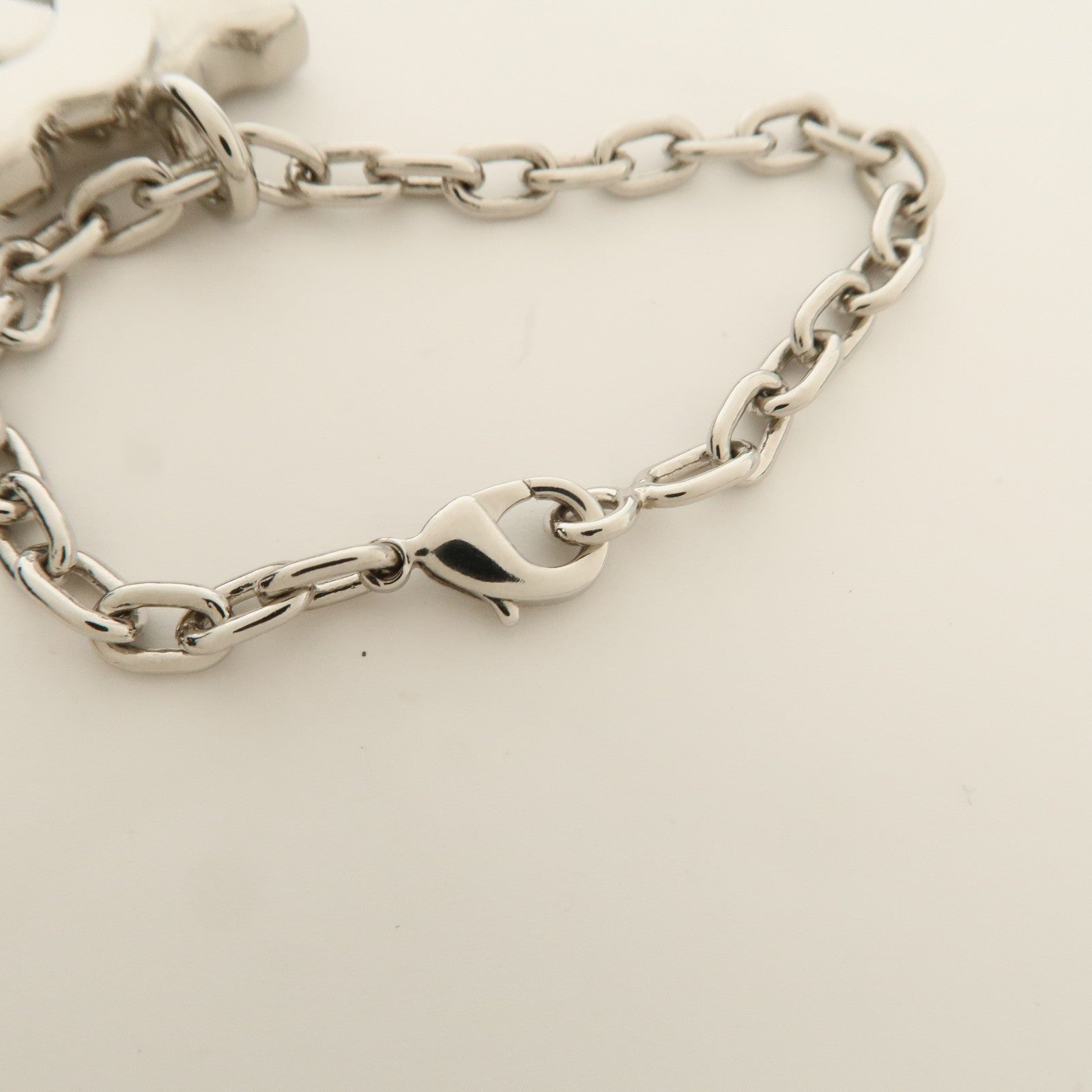 Cartier Must Line Logo Metal Bag Charm Key Charm Silver