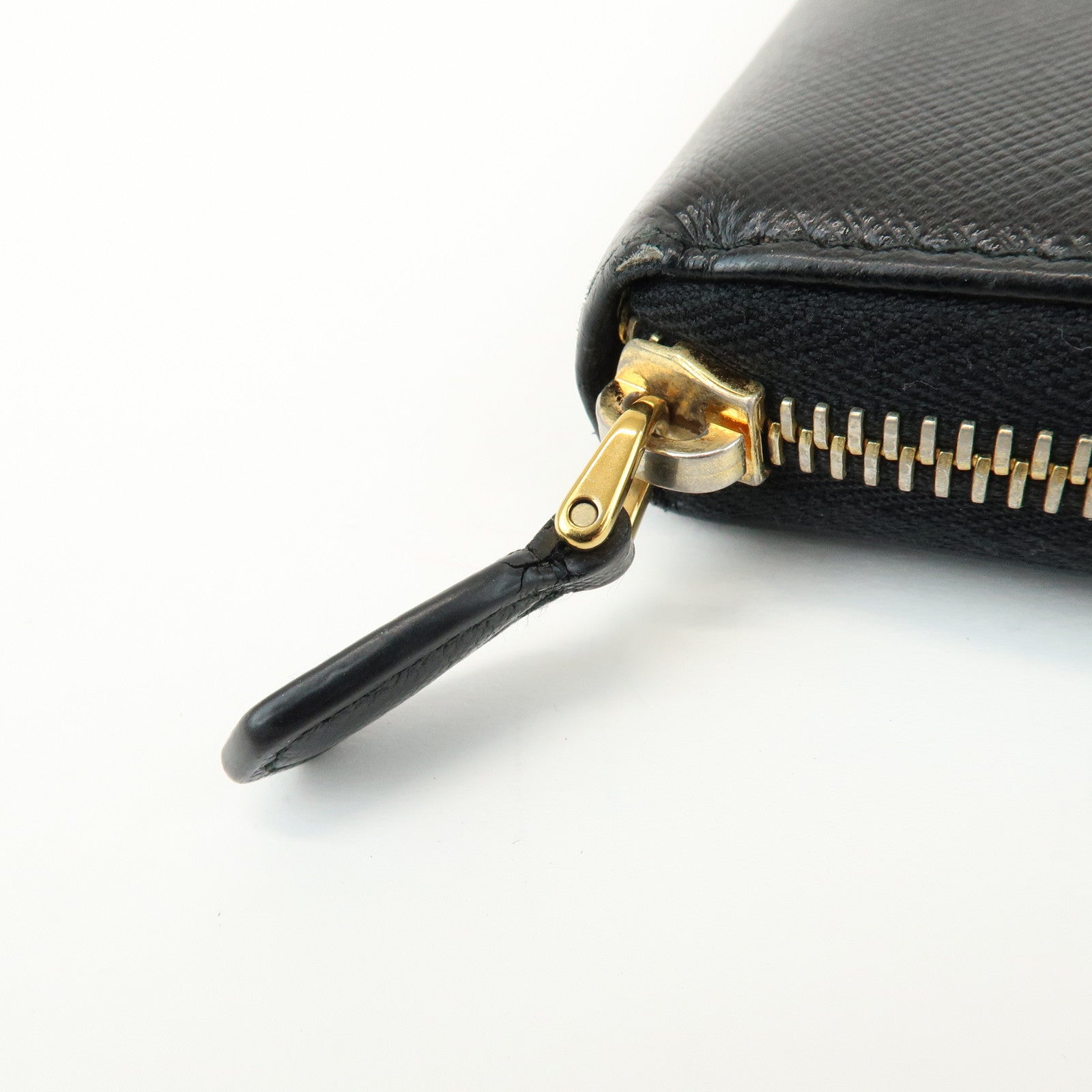 PRADA Saffiano Leather Ribbon Round Zippy Wallet Black 1M0506
