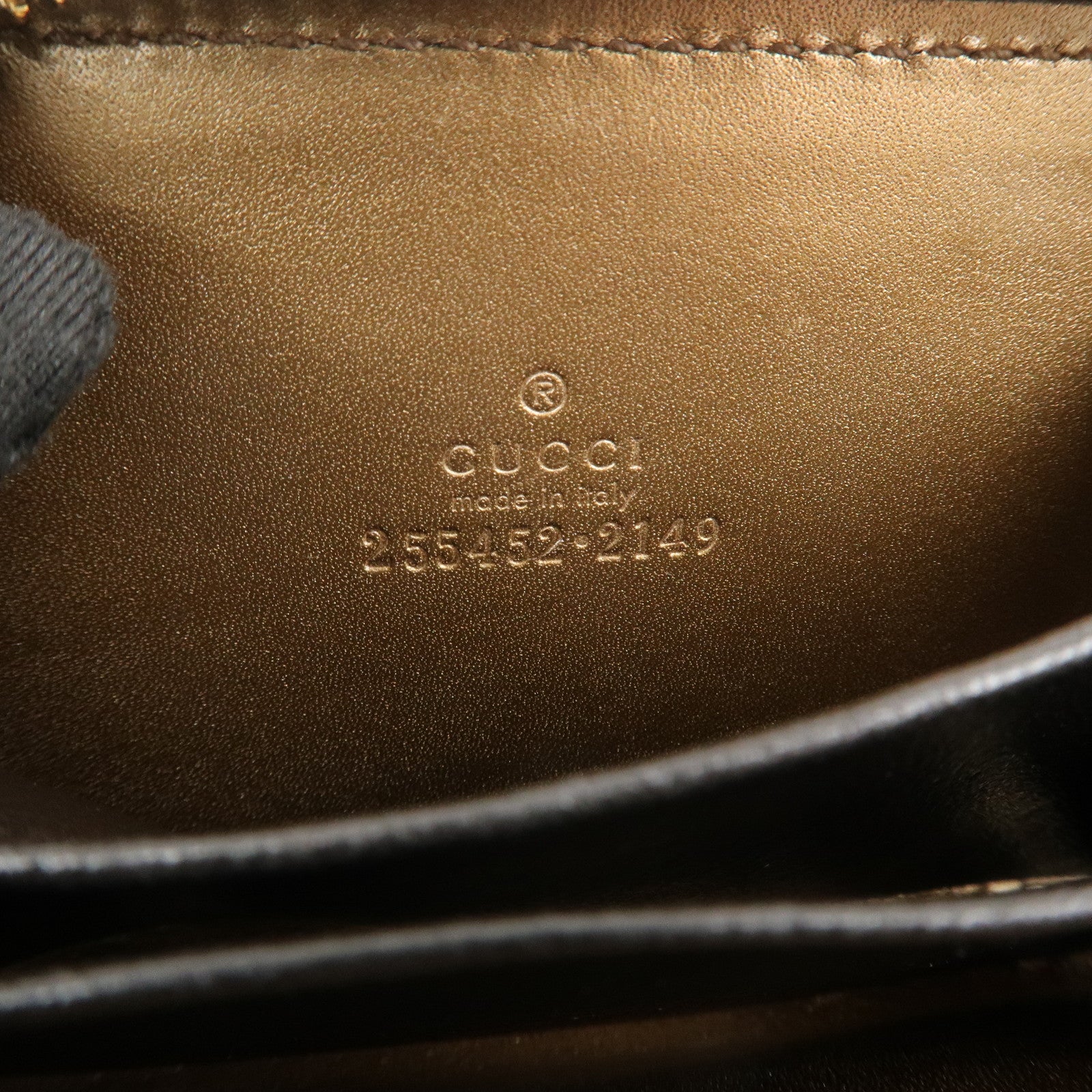 GUCCI Micro Guccissima Leather Zippy Wallet Card Case Bronze 255452