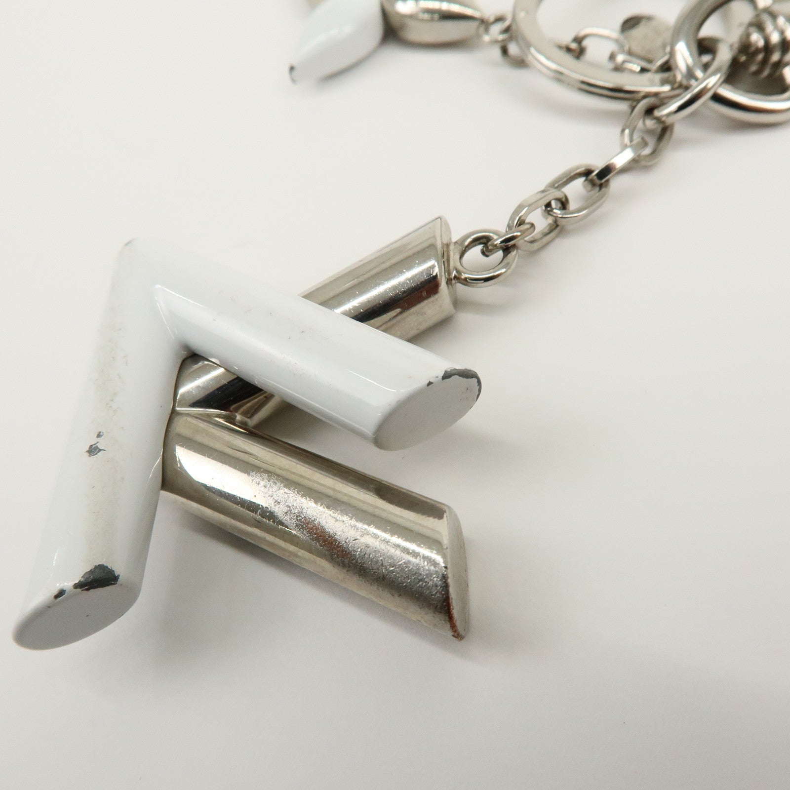 Louis Vuitton Twist Metal Bag Charm Key Holder Silver White M68010