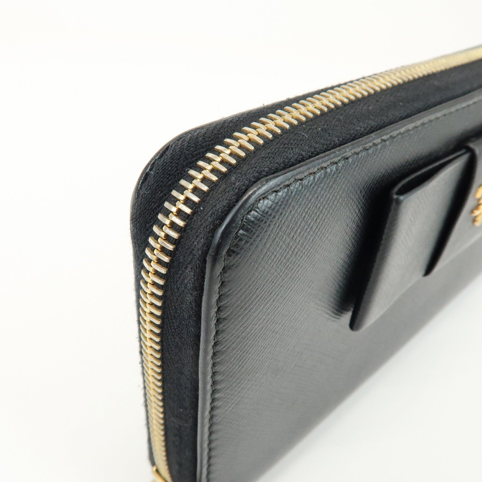 PRADA Saffiano Leather Ribbon Round Zippy Wallet Black 1M0506